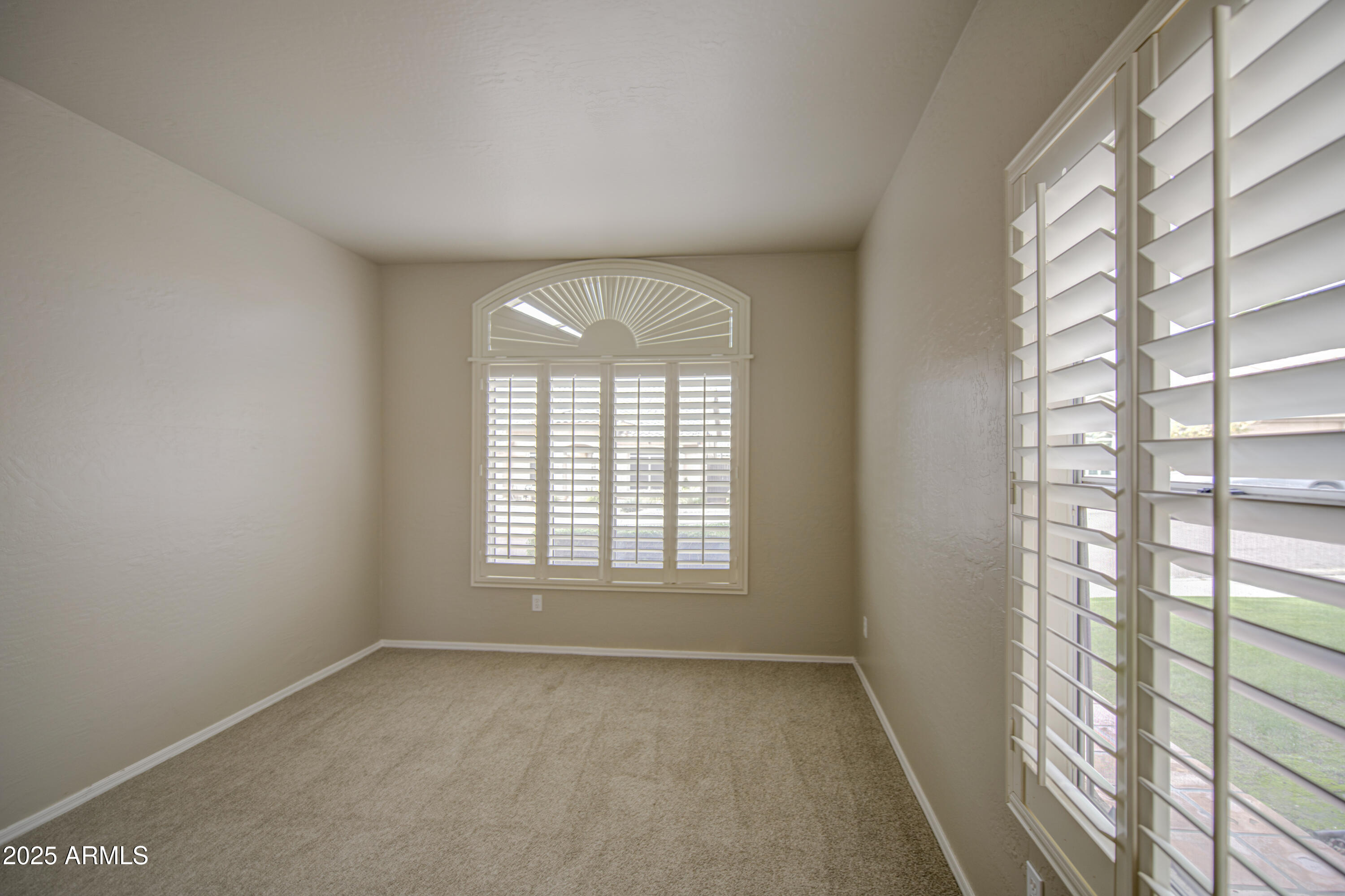 16237 South 13th Street Phoenix, AZ 85048 - Photo 12 of 68 a view of an empty room with a window