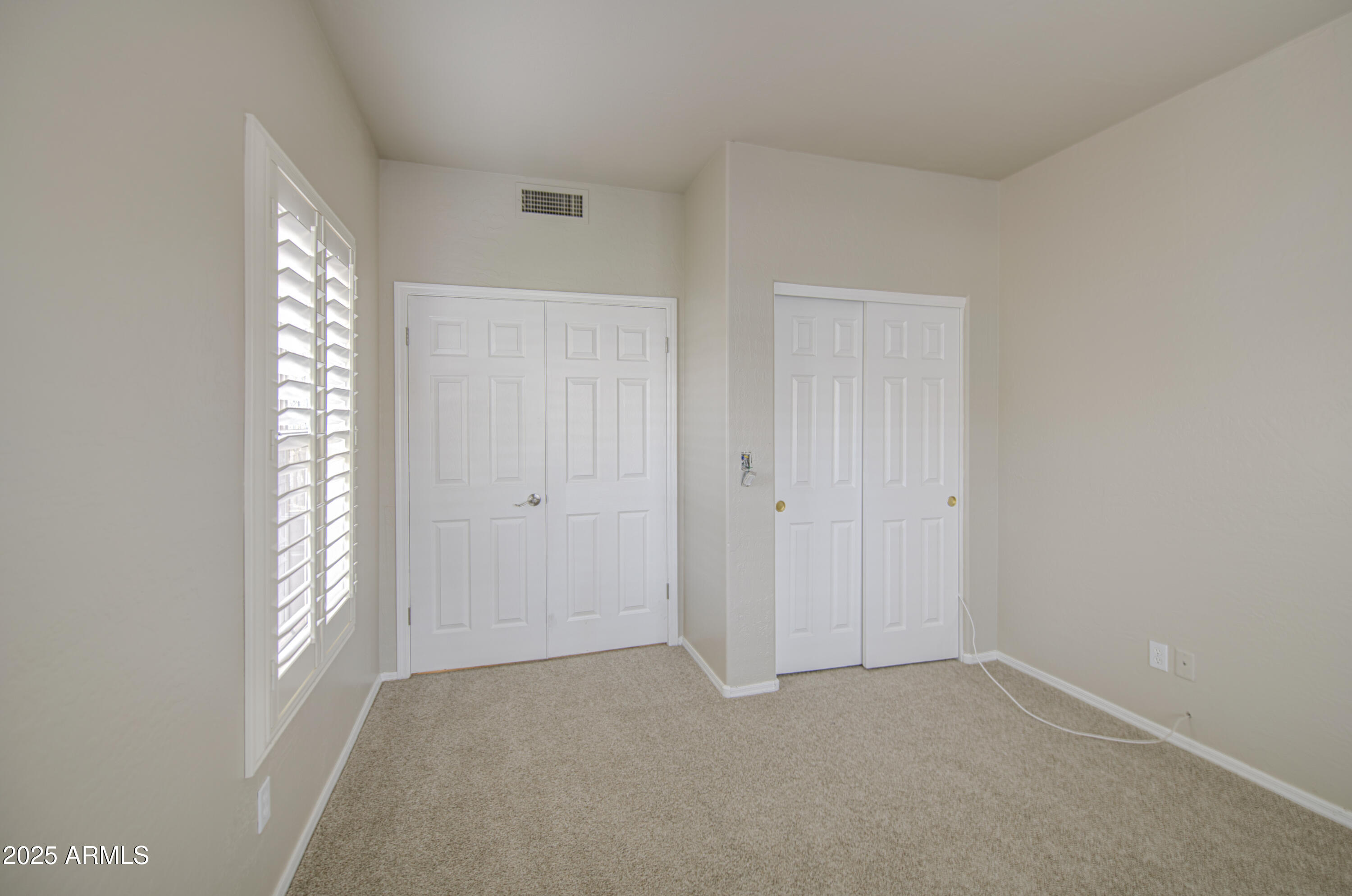 16237 South 13th Street Phoenix, AZ 85048 - Photo 13 of 68 a view of an empty room and window