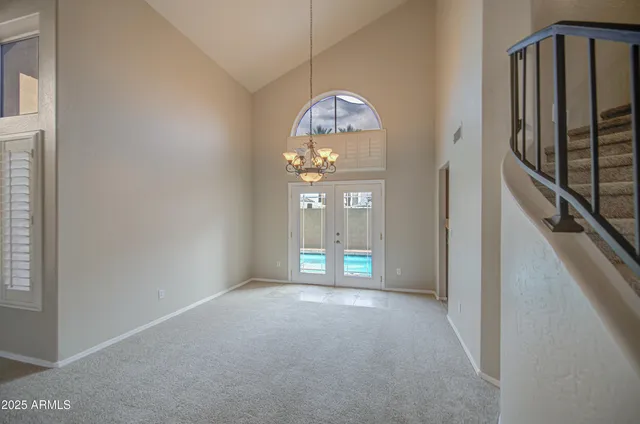 a view of a hallway view with staircase