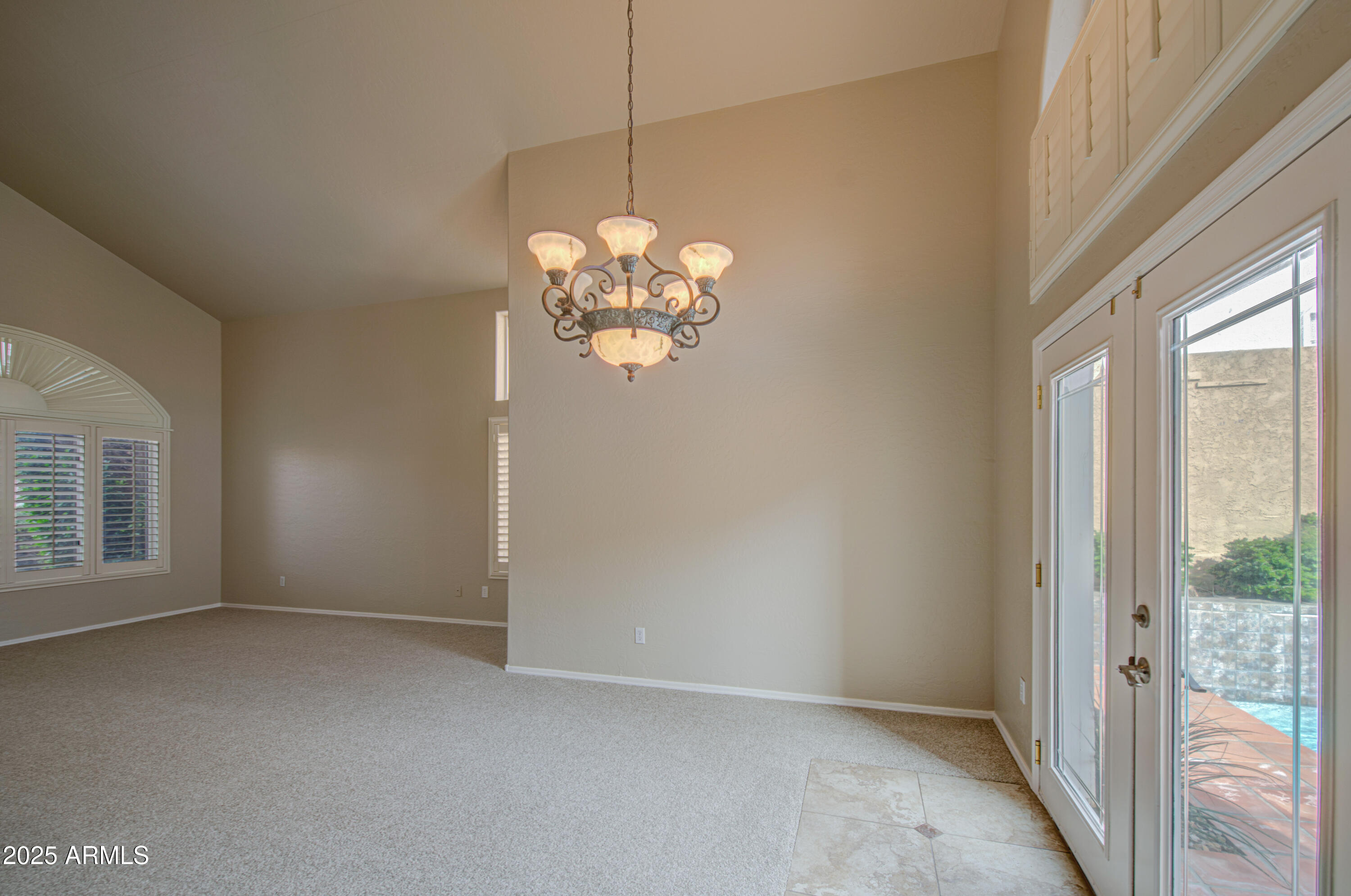 16237 South 13th Street Phoenix, AZ 85048 - Photo 21 of 68 a view of an empty room with a window