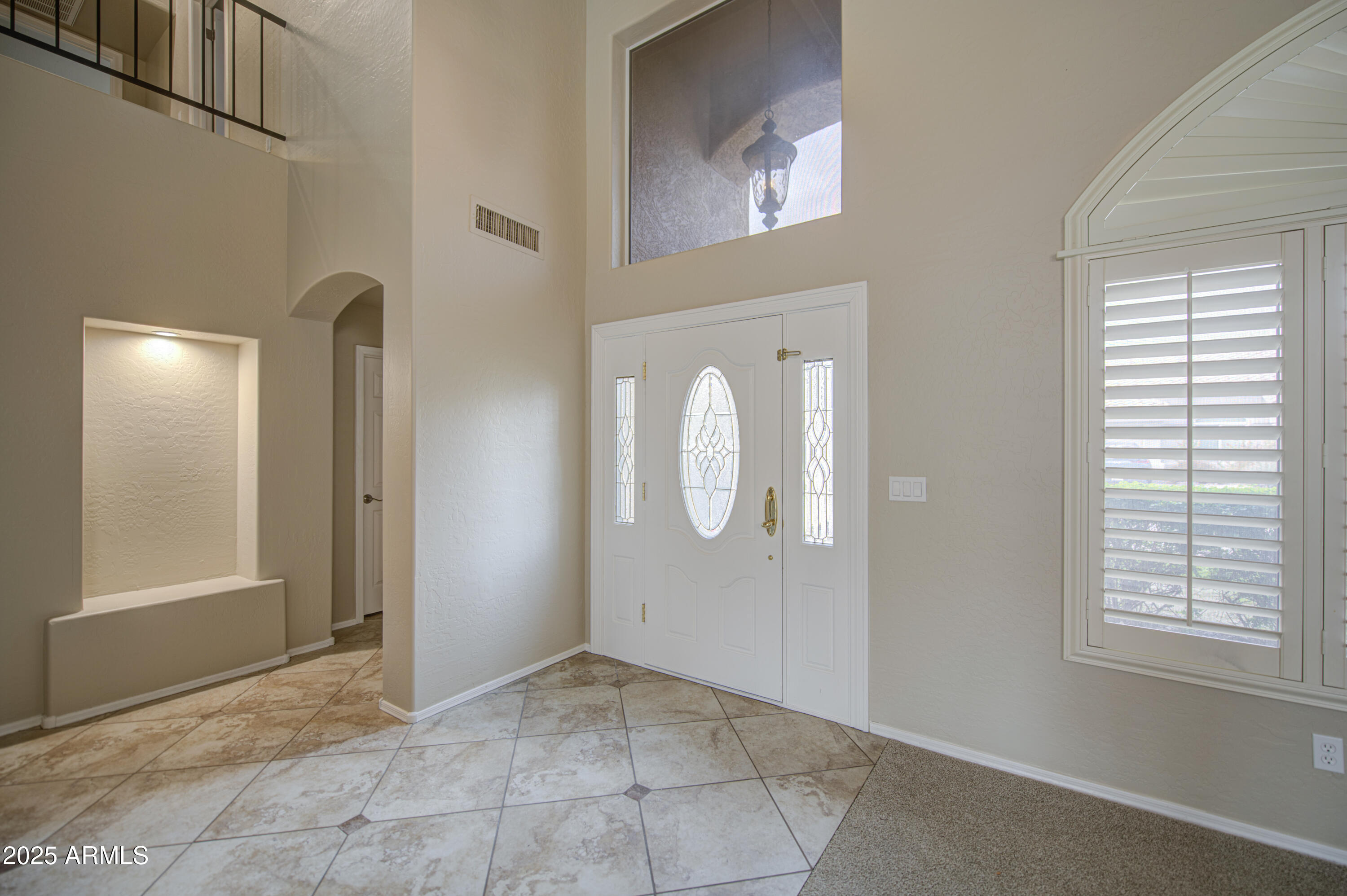 16237 South 13th Street Phoenix, AZ 85048 - Photo 22 of 68 a view of an entryway with a livingroom