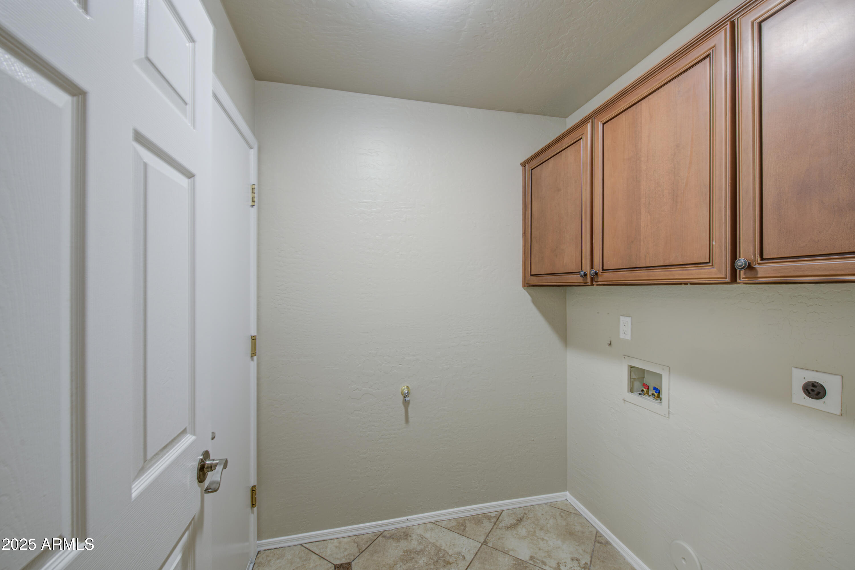 16237 South 13th Street Phoenix, AZ 85048 - Photo 35 of 68 a view of storage and utility room with racks on the wall