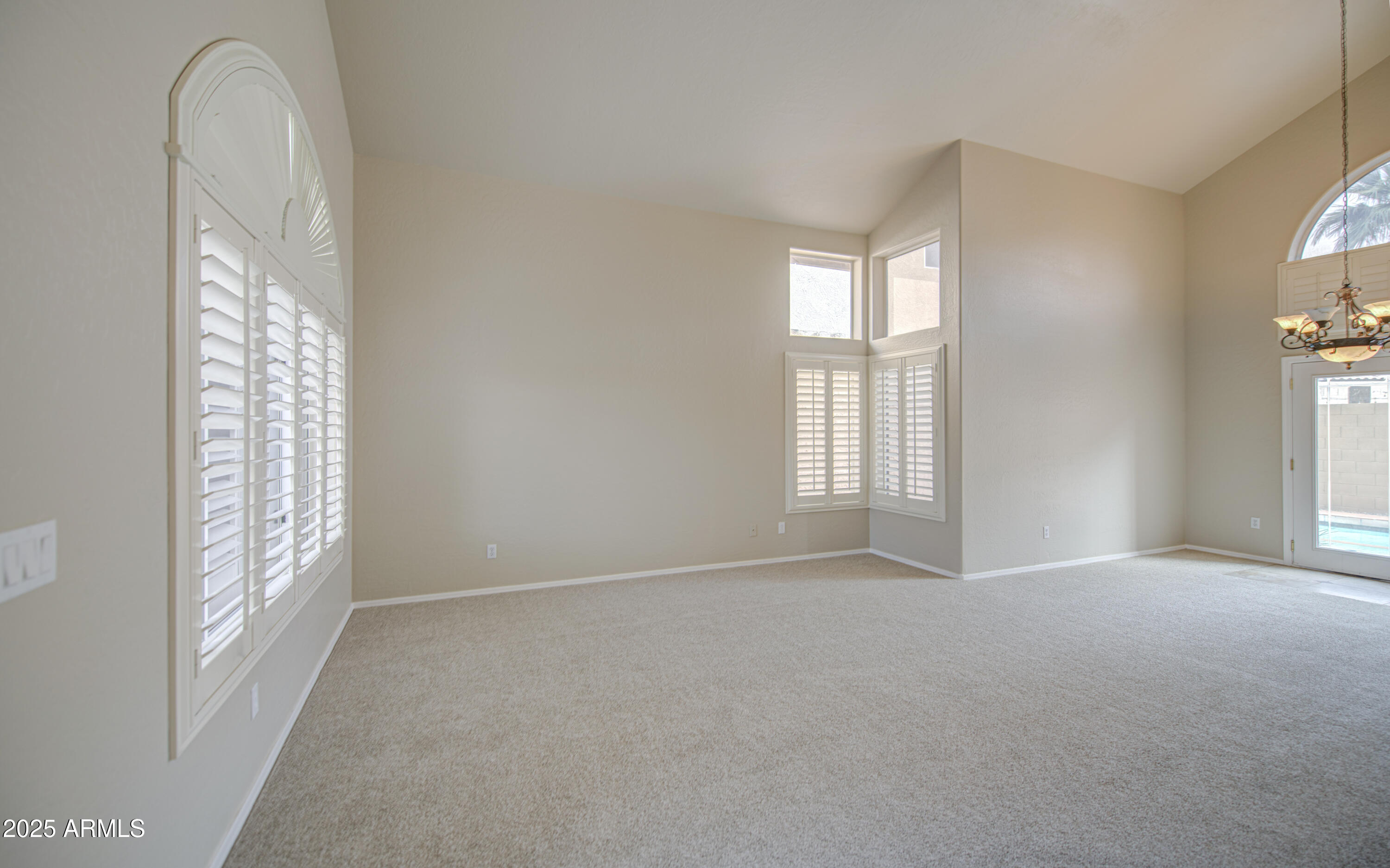 16237 South 13th Street Phoenix, AZ 85048 - Photo 36 of 68 a view of an empty room with a window