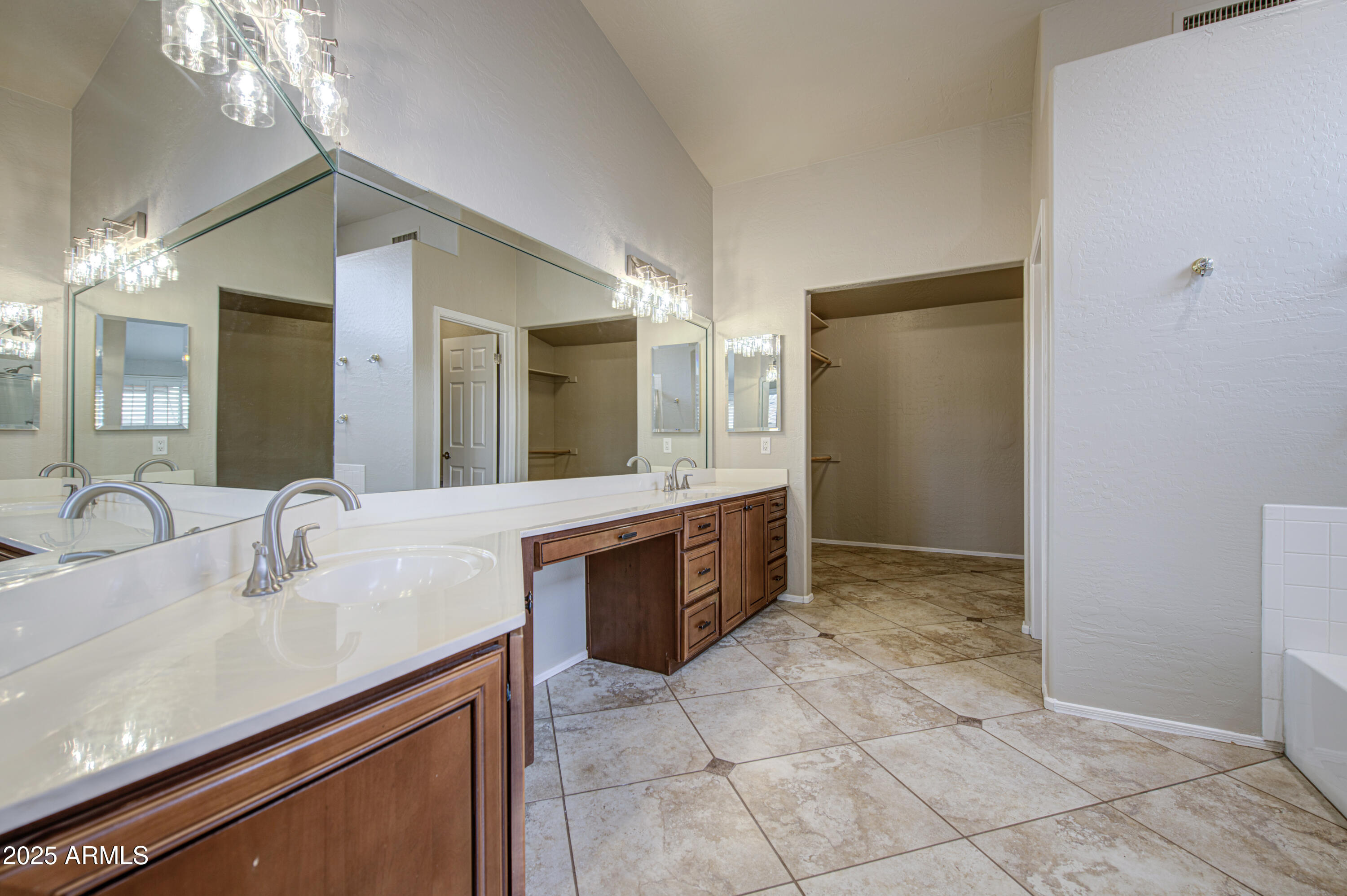 16237 South 13th Street Phoenix, AZ 85048 - Photo 47 of 68 a large bathroom with a sink and a mirror