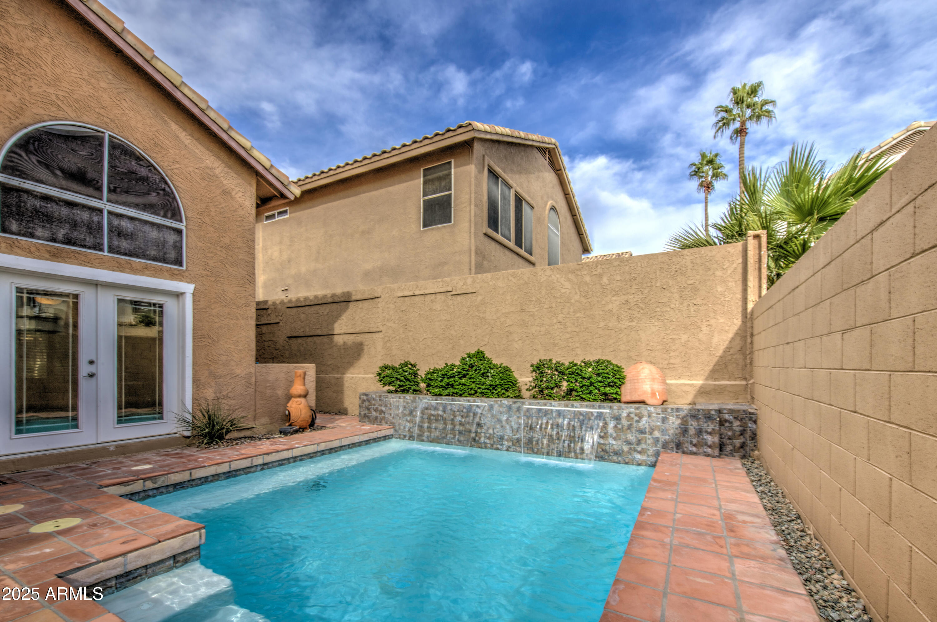 16237 South 13th Street Phoenix, AZ 85048 - Photo 61 of 68 a front view of a house with a yard