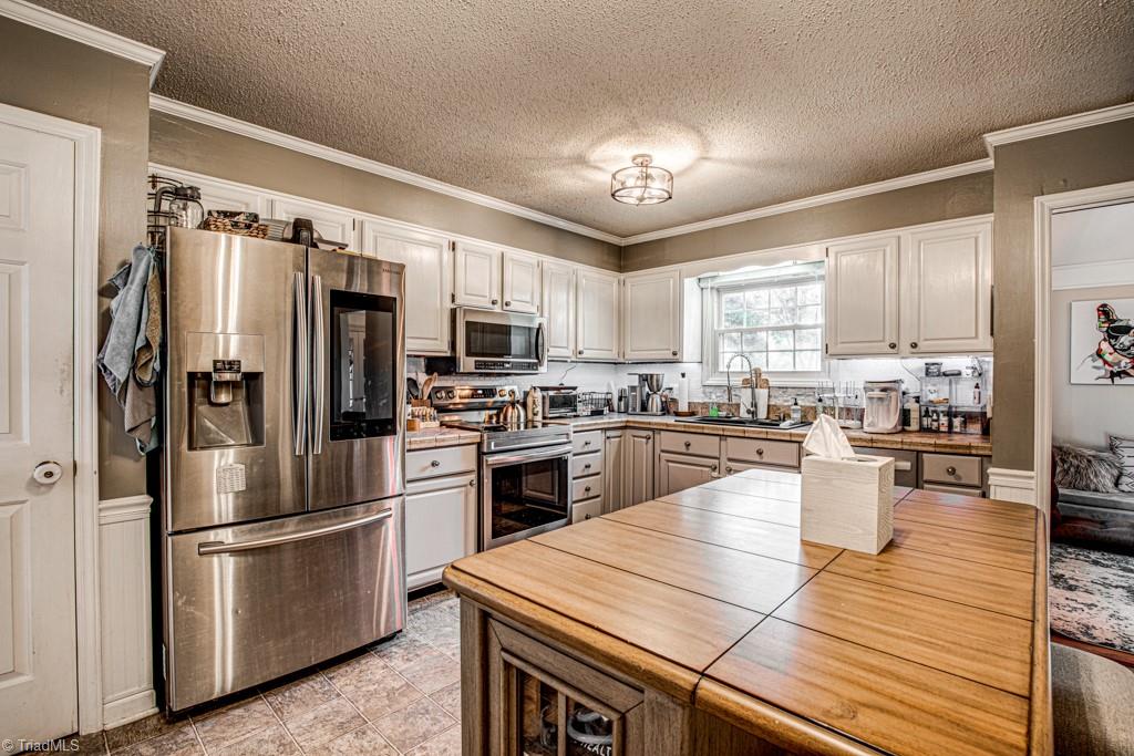 261 Brittany Road Rural Hall, NC 27045 - Photo 2 of 43 Kitchen-pantry door on left