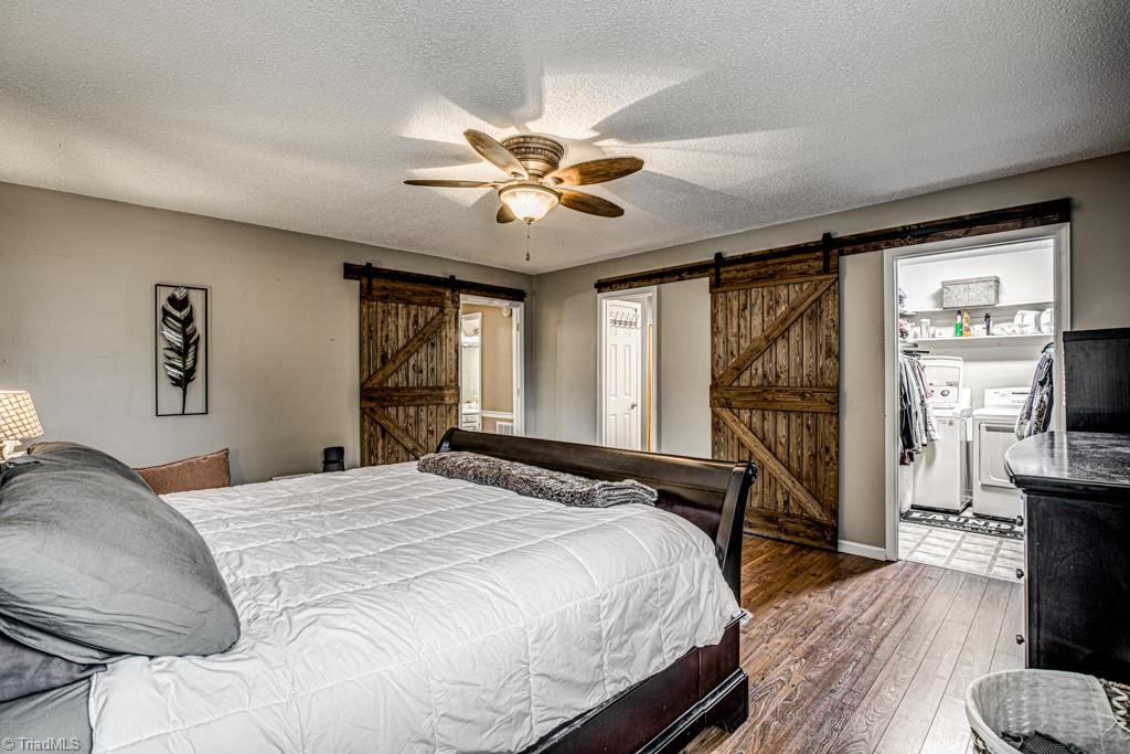 261 Brittany Road Rural Hall, NC 27045 - Photo 24 of 43 Primary - walk-in closet has laundry in the back.