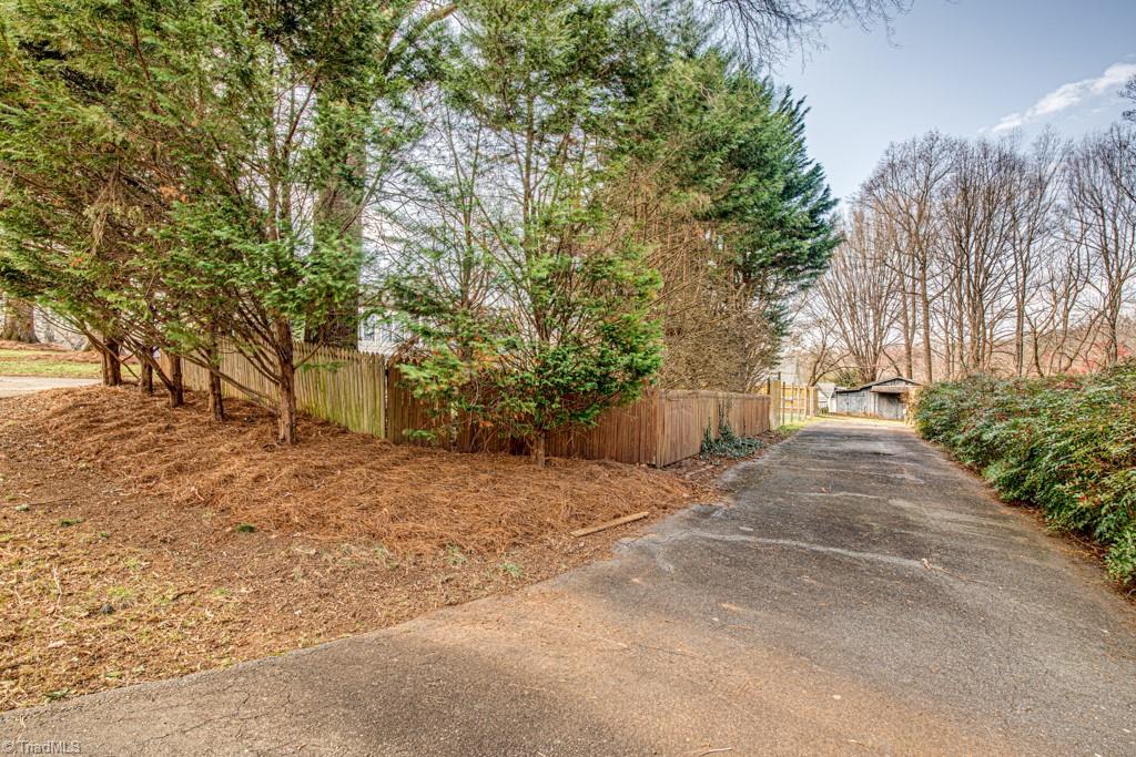 261 Brittany Road Rural Hall, NC 27045 - Photo 38 of 43 Second Driveway between backyard and rear lot