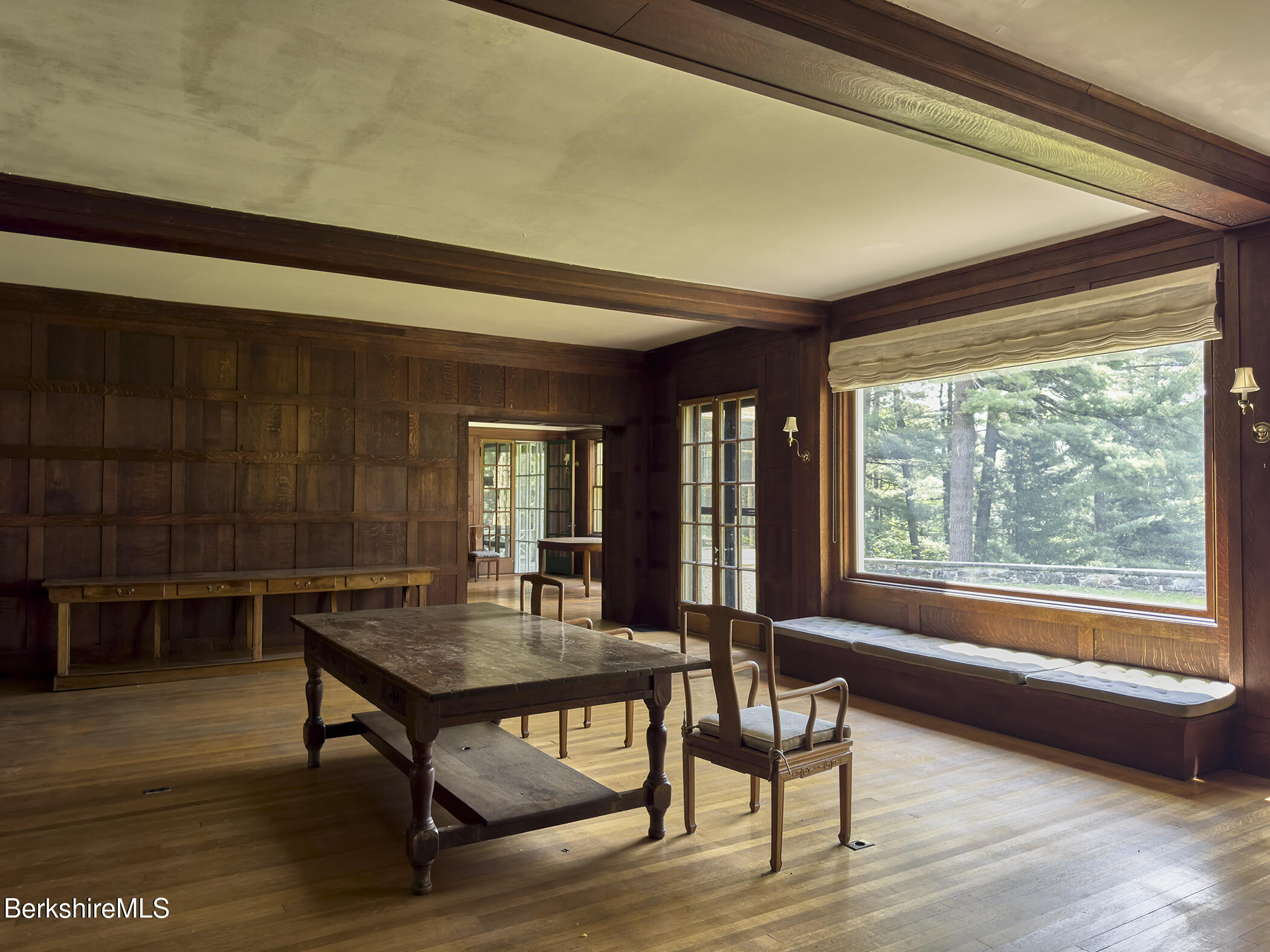 319 Under Mountain Road Lenox, MA 01240 - Photo 12 of 57 a view of a dining room with furniture and window