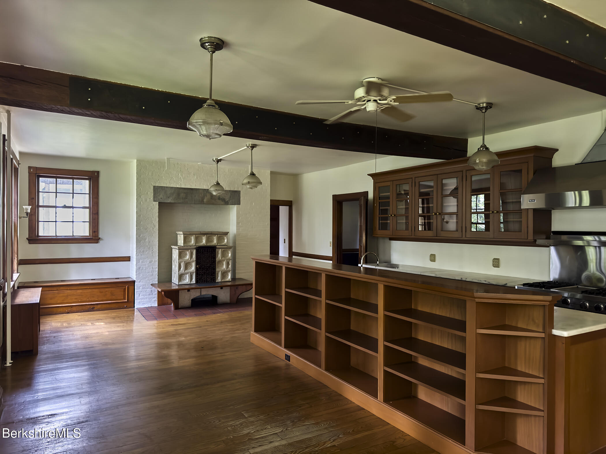 319 Under Mountain Road Lenox, MA 01240 - Photo 18 of 57 a view of a room with shelves and windows