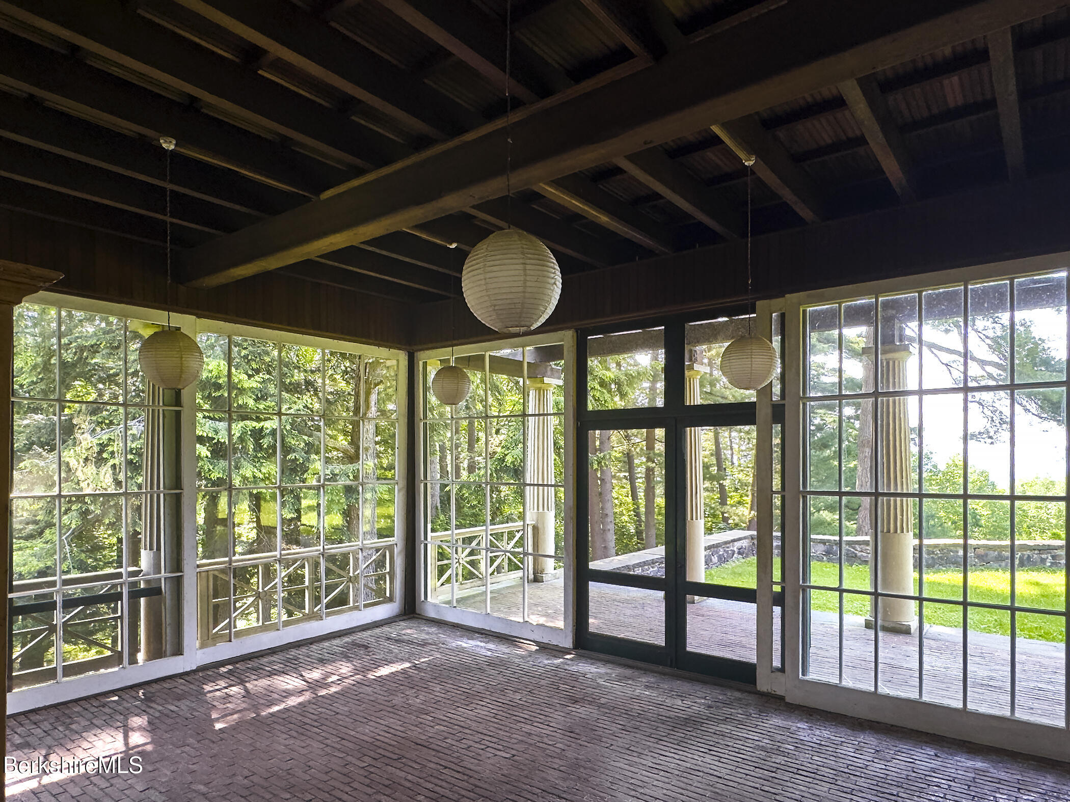 319 Under Mountain Road Lenox, MA 01240 - Photo 24 of 57 a view of an empty room with wooden floor
