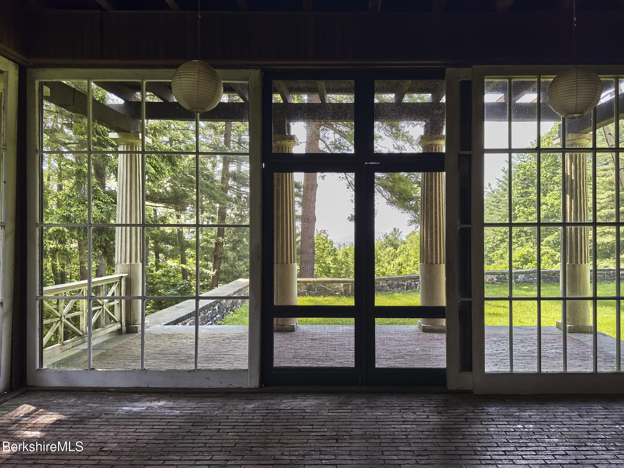 319 Under Mountain Road Lenox, MA 01240 - Photo 25 of 57 a view of a large window with an outdoor space