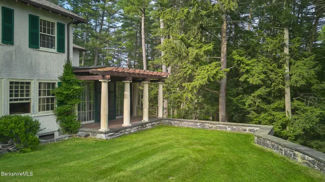 a view of lobby with furniture and chandelier
