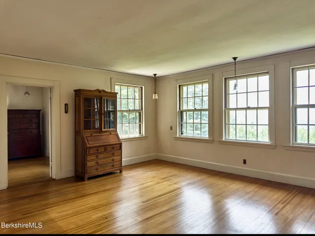 a view of a house with a large window