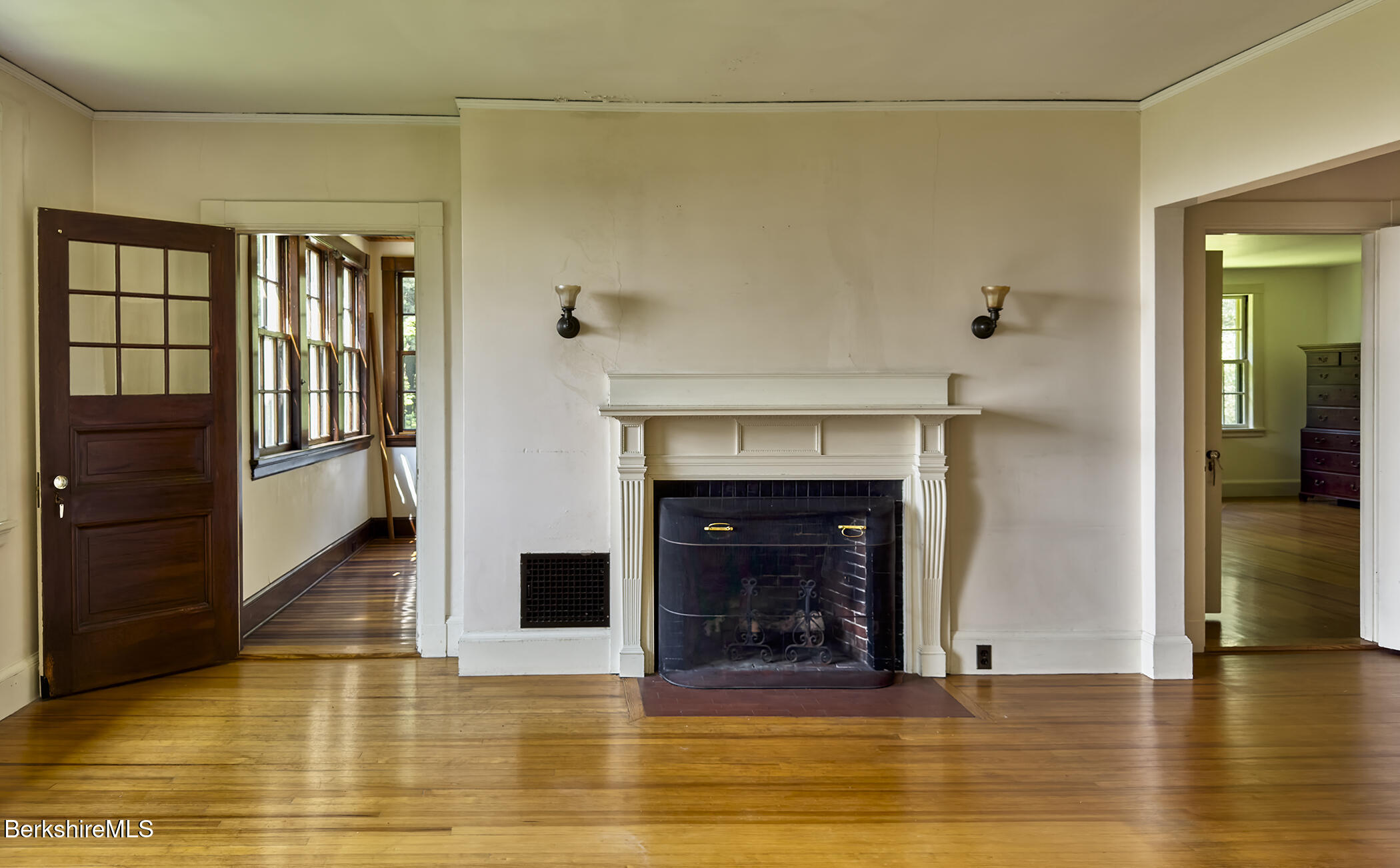 319 Under Mountain Road Lenox, MA 01240 - Photo 37 of 57 a view of a livingroom with wooden floor and a fireplace