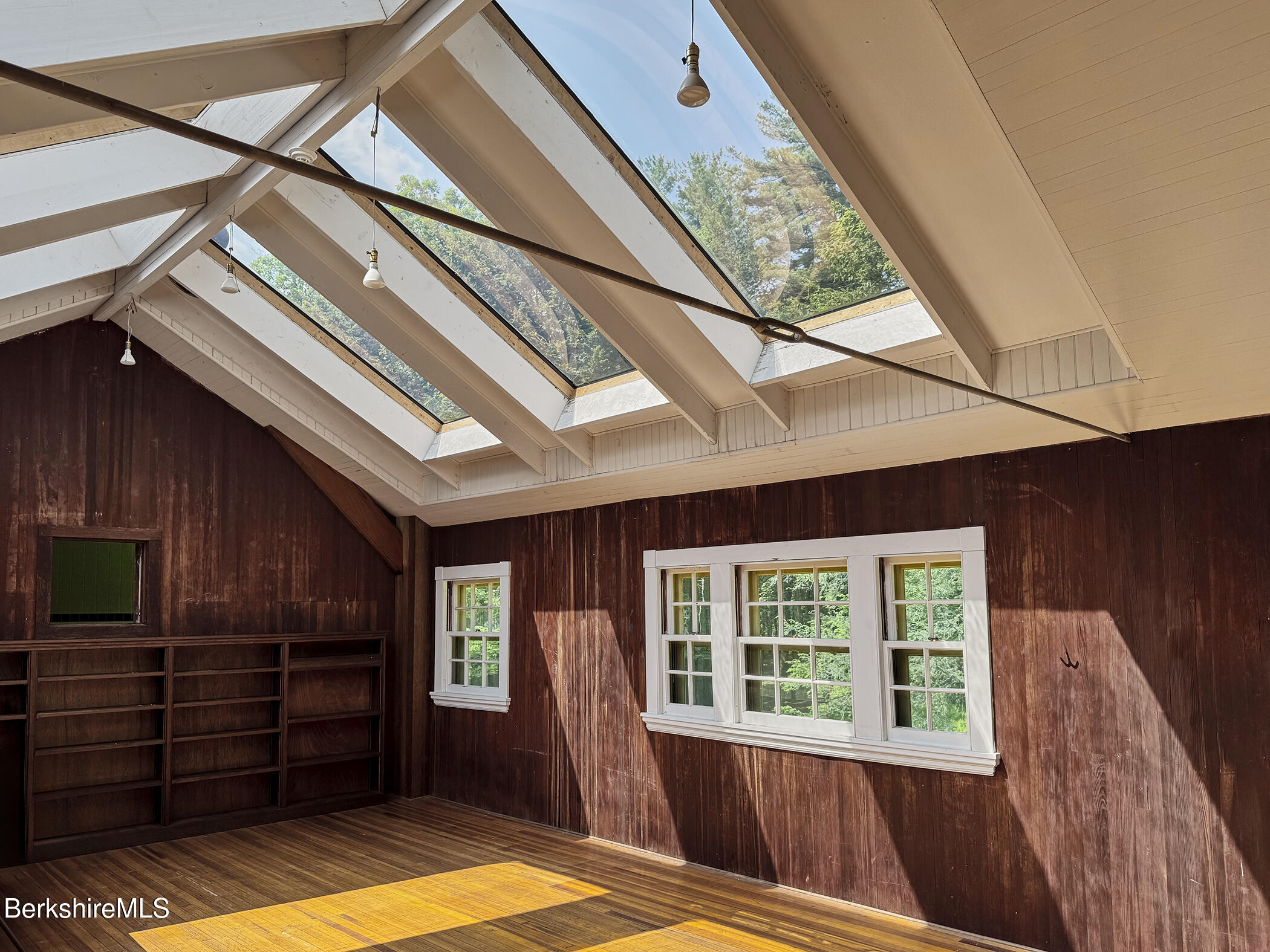 319 Under Mountain Road Lenox, MA 01240 - Photo 43 of 57 a view of a house with a large window