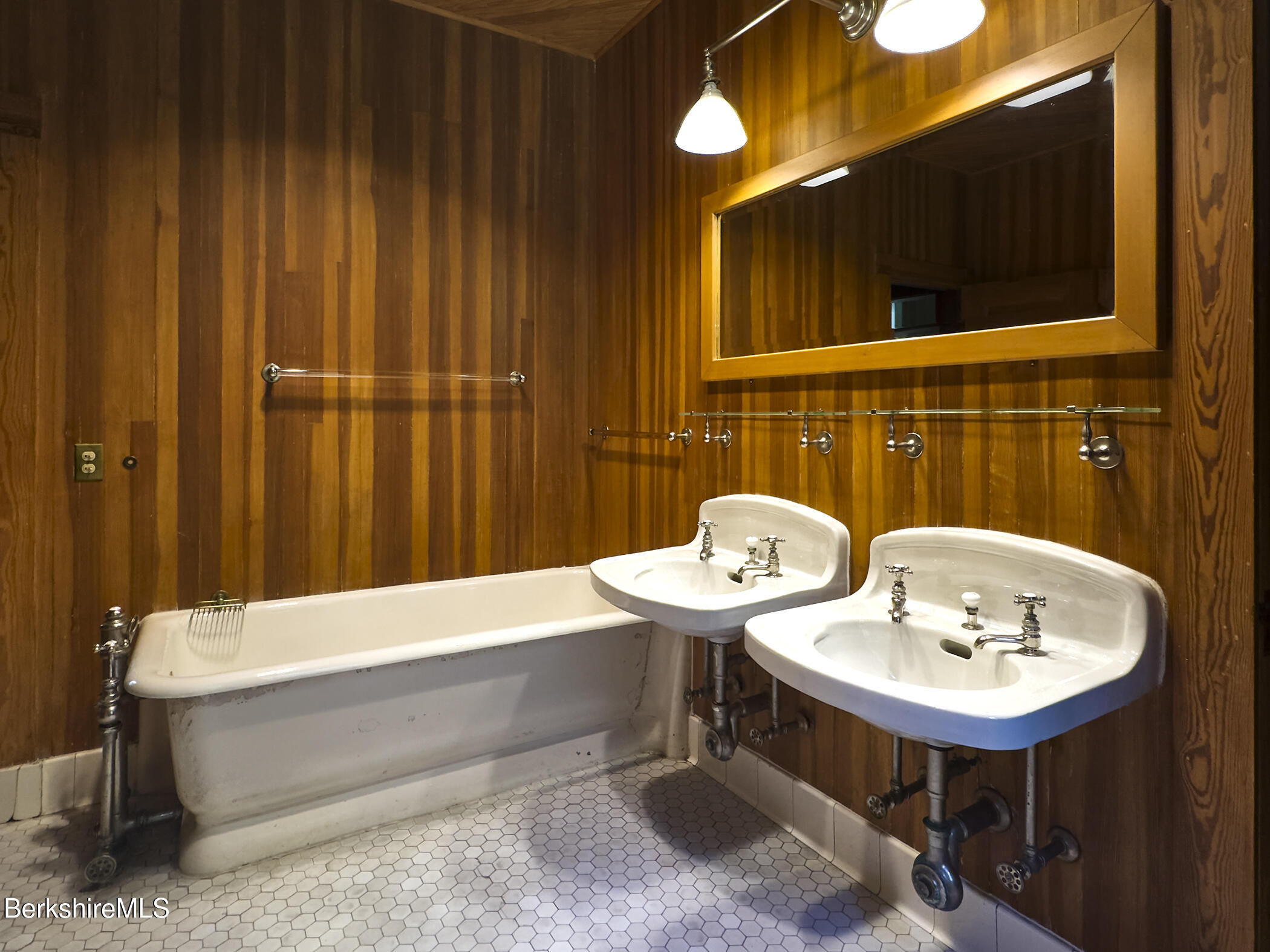 319 Under Mountain Road Lenox, MA 01240 - Photo 46 of 57 a bathroom with a sink and a mirror