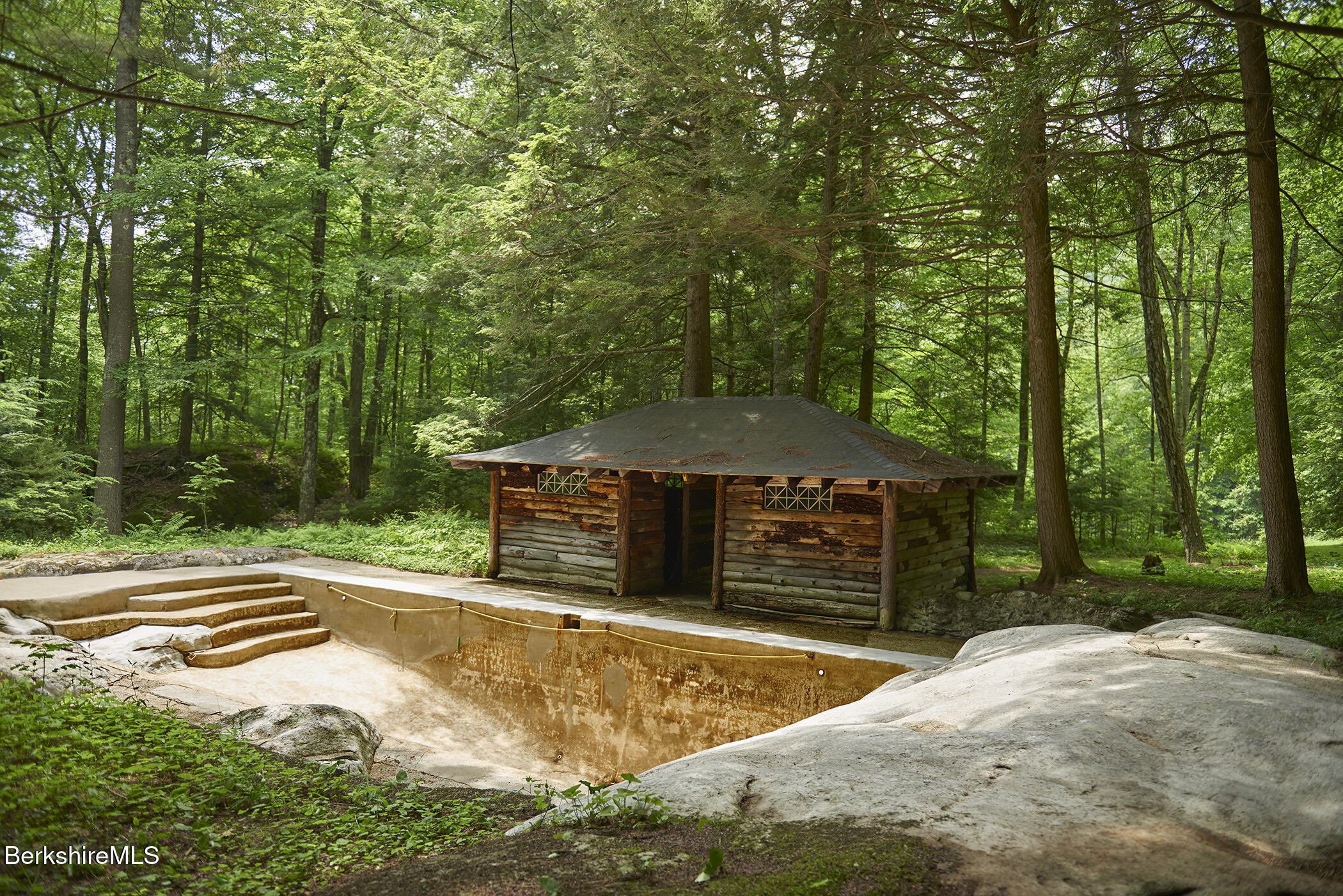 319 Under Mountain Road Lenox, MA 01240 - Photo 48 of 57 a view of a swimming pool with a patio