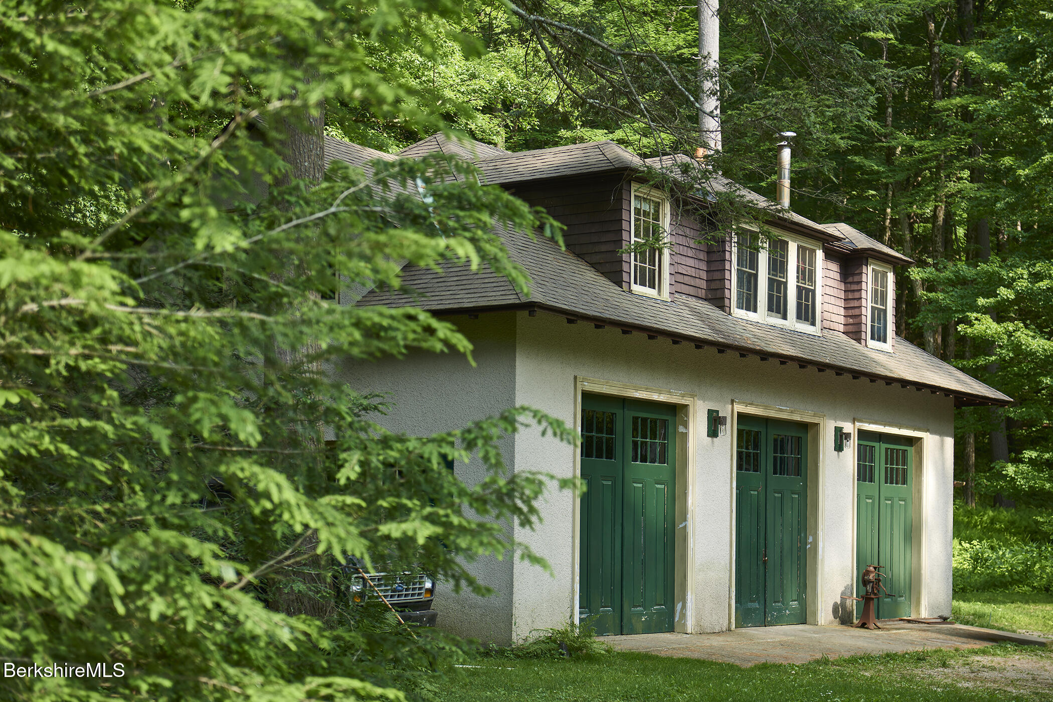 319 Under Mountain Road Lenox, MA 01240 - Photo 52 of 57 a front view of a house with a yard