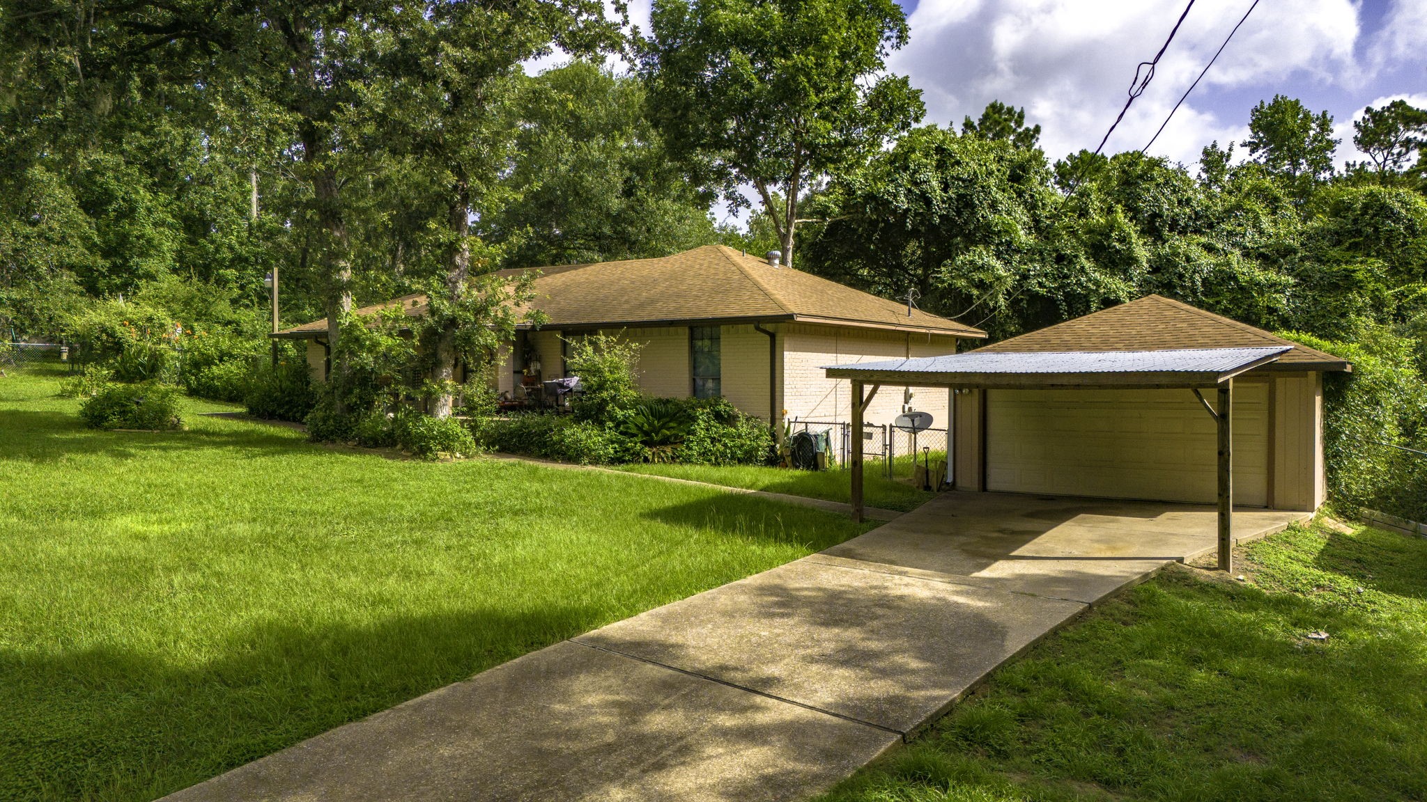a view of a house with a garden
