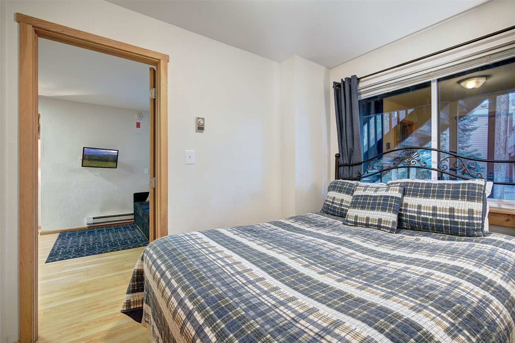 270 Primrose Path, Unit 33B Breckenridge, CO 80424 - Photo 14 of 21 a bedroom with a bed and a window