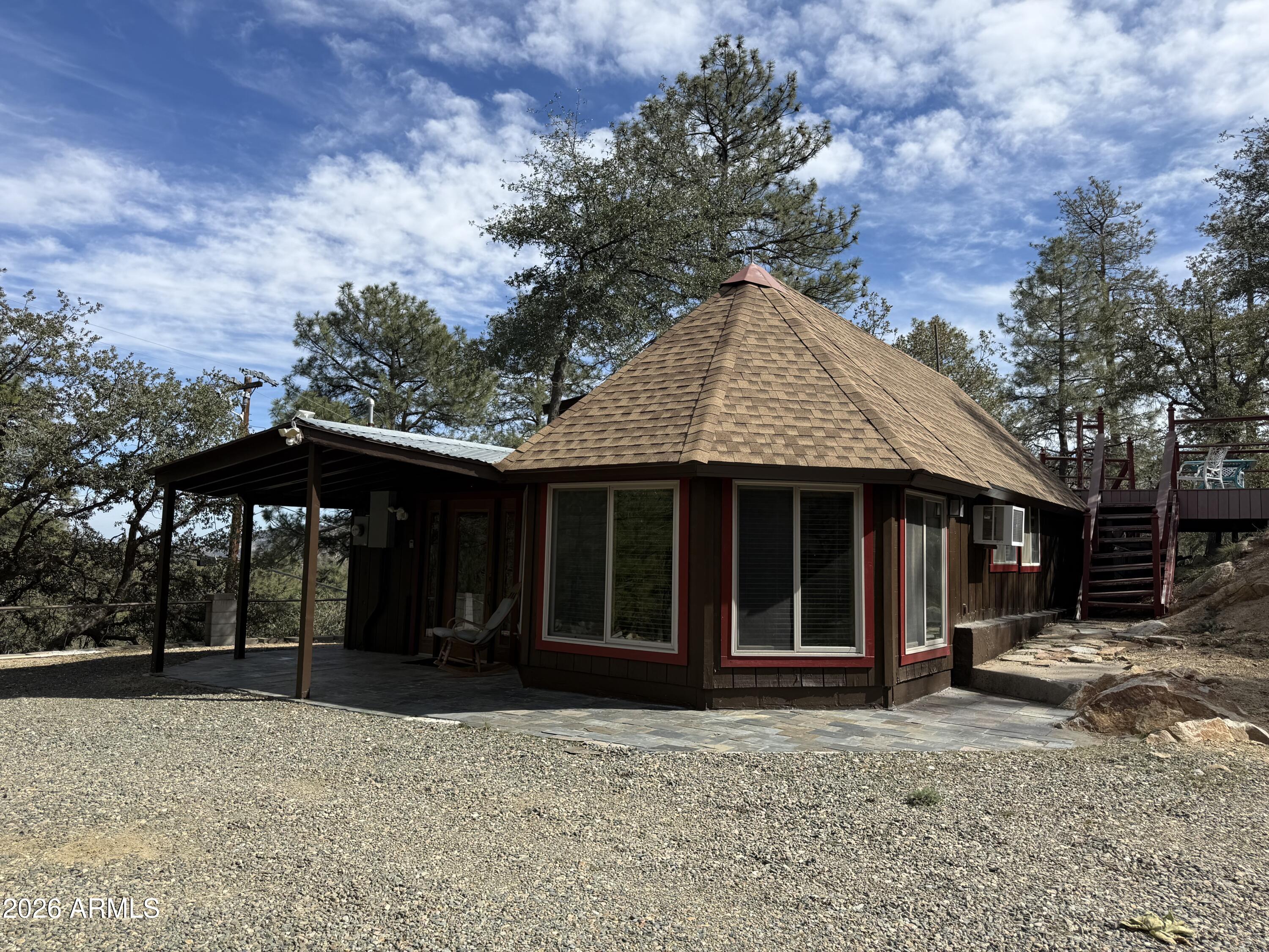 front view of a house with a yard