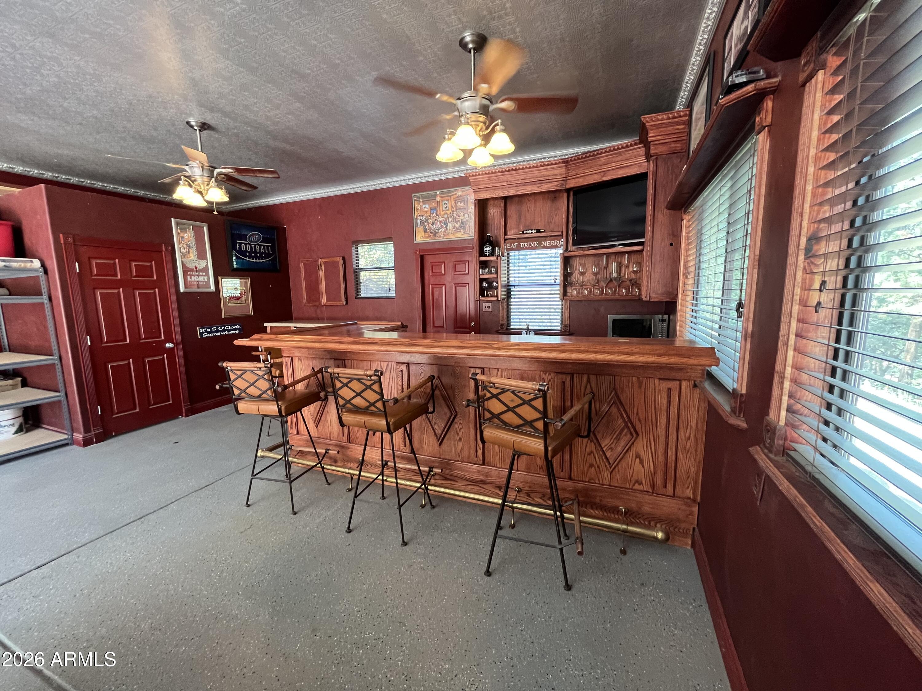 23338 Sunny South Road Crown King, AZ 86343 - Photo 23 of 32 a view of a chairs and tables in the balcony