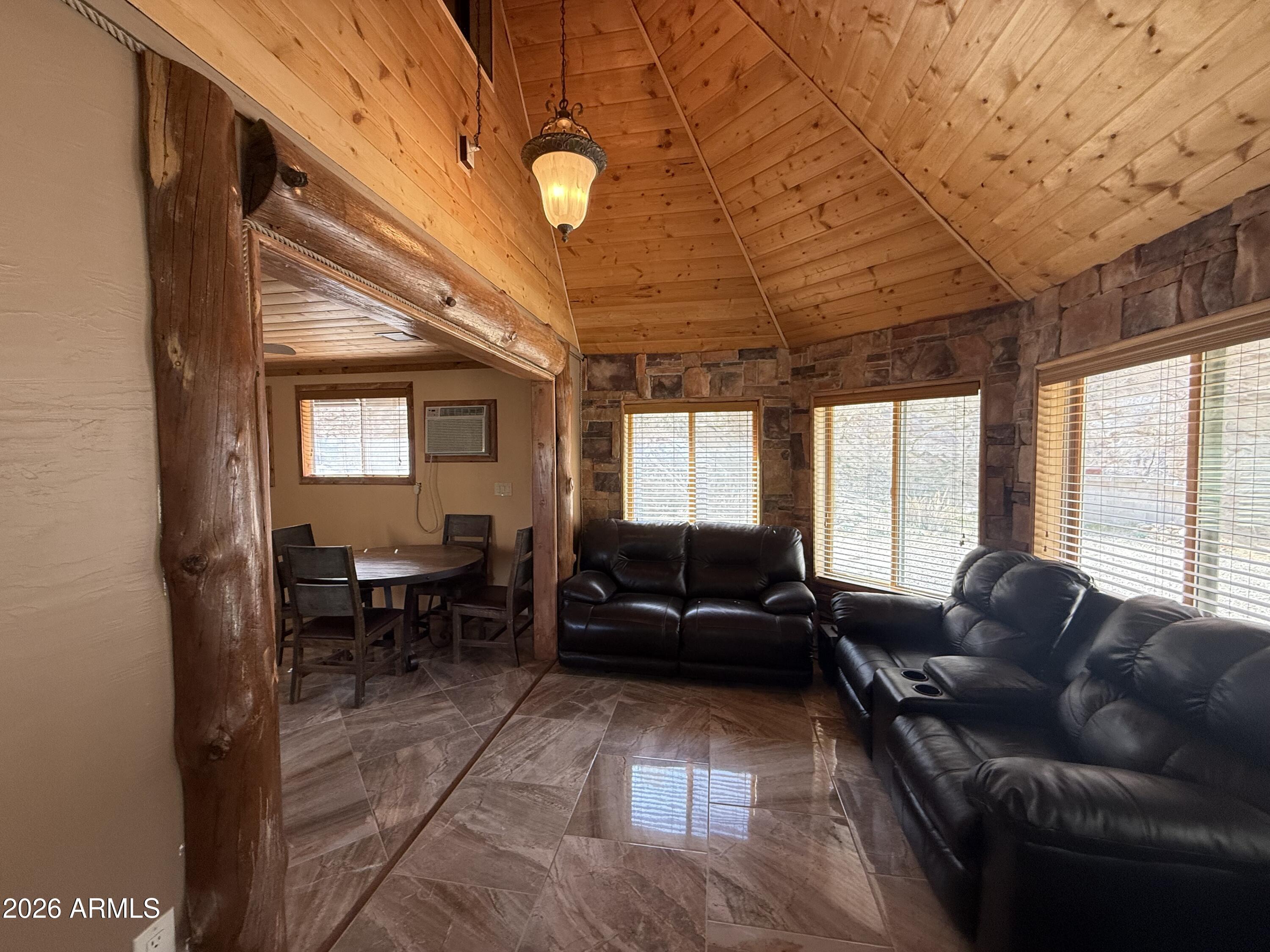 23338 Sunny South Road Crown King, AZ 86343 - Photo 5 of 32 a living room with furniture and a large window