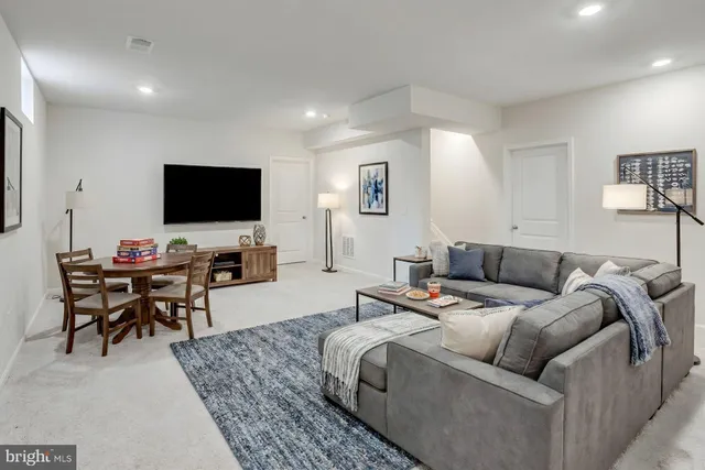 a view of a backyard with tall trees