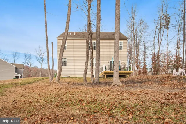 a view of balcony with wooden floor and outdoor seating