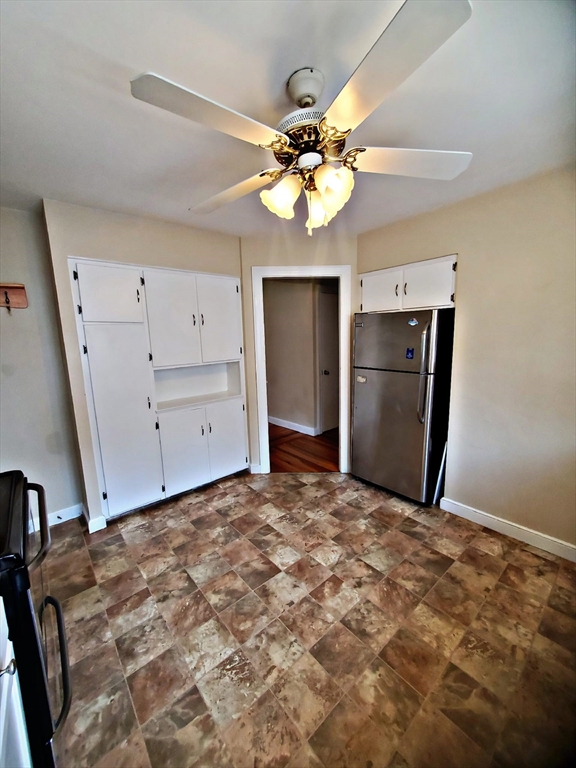 8 Ashland Street, Unit 1L Worcester, MA 01609 - Photo 13 of 27 a view of a livingroom with a ceiling fan