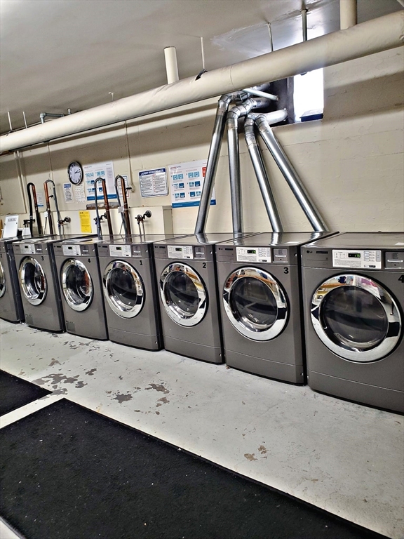 8 Ashland Street, Unit 1L Worcester, MA 01609 - Photo 24 of 27 a utility room with dryer and washer