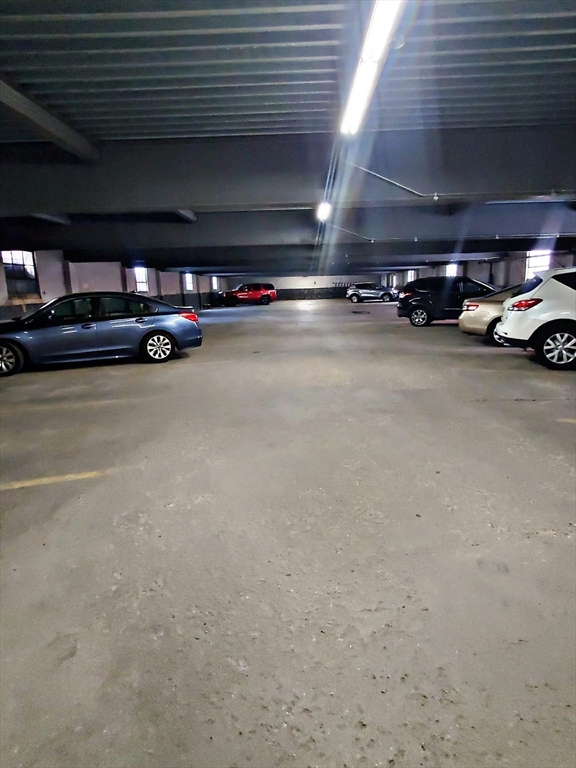 8 Ashland Street, Unit 1L Worcester, MA 01609 - Photo 26 of 27 a car parked in parking