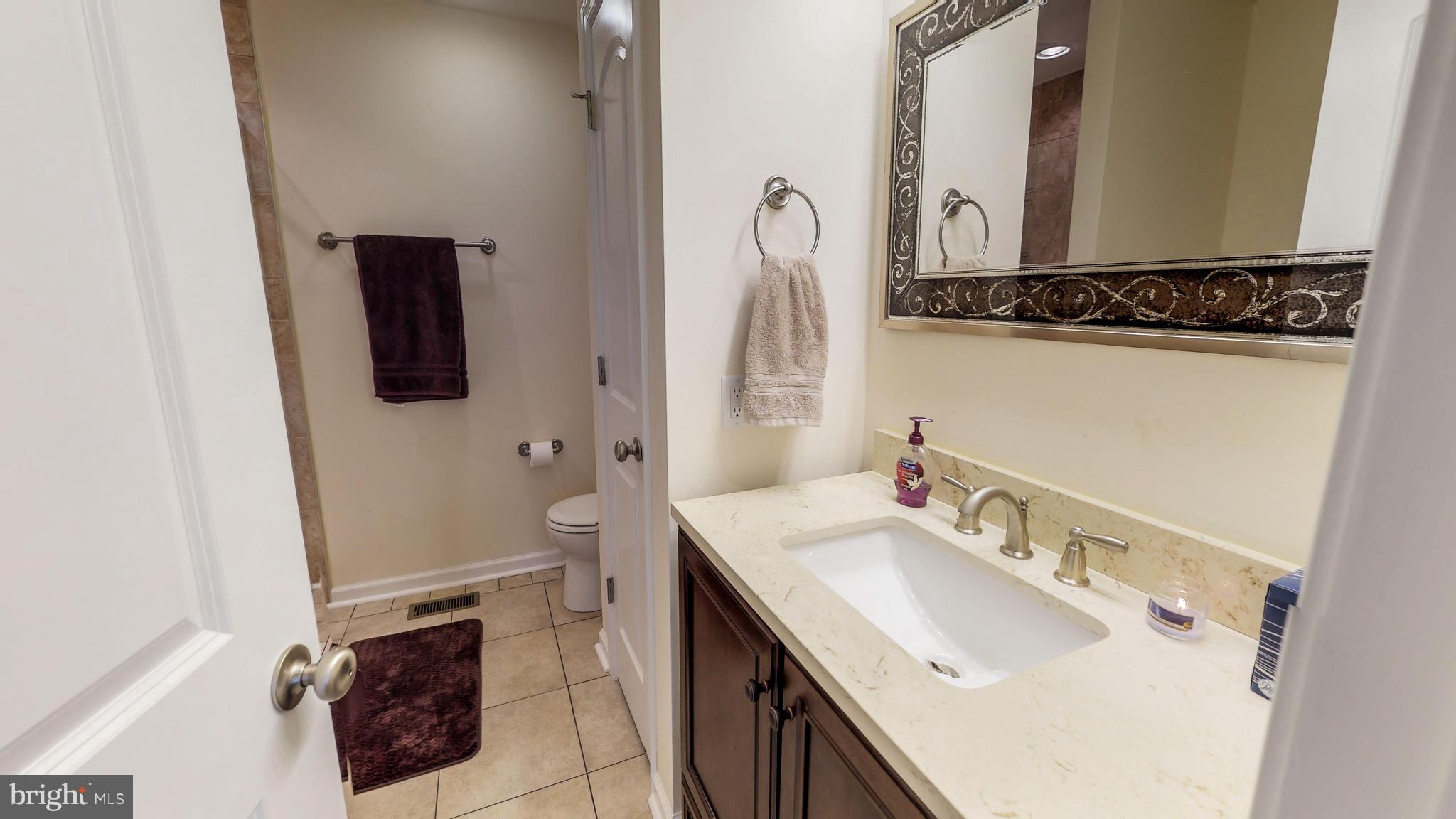 107 Dimension Road Inwood, WV 25428 - Photo 13 of 28 Master bath with tile floors