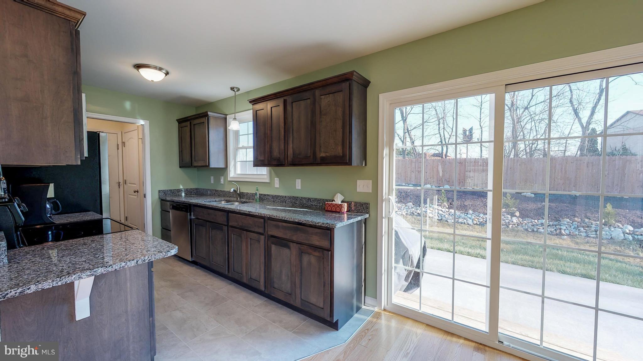 Kitchen with access to rear deck