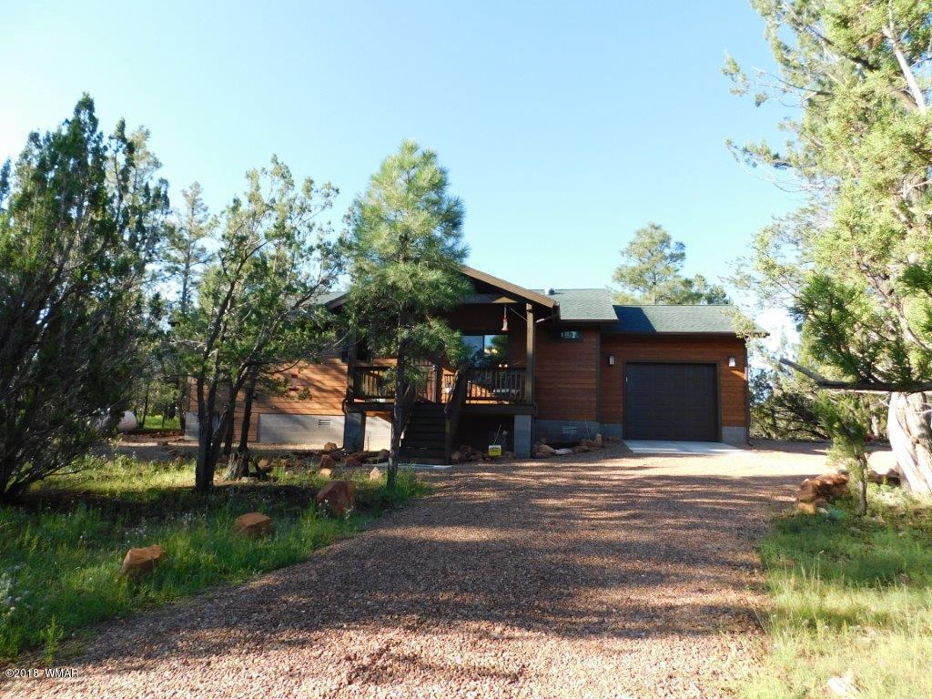 1941 Rim View Lane Heber, AZ 85928 - Photo 35 of 41 a front view of a house with a yard