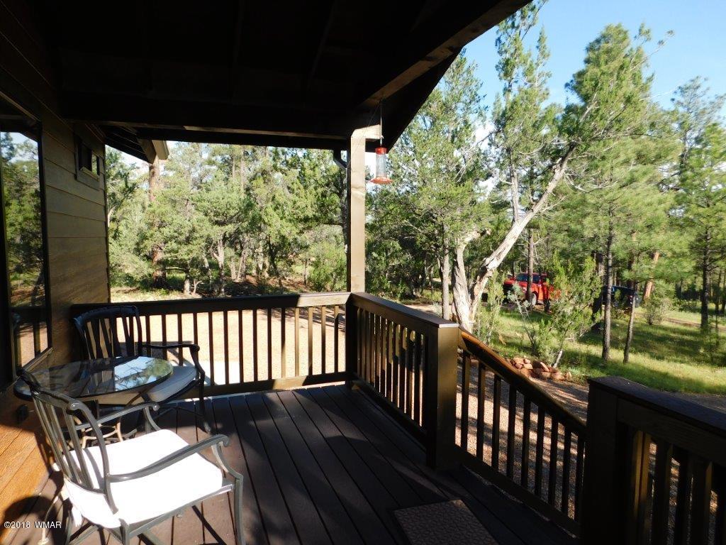 1941 Rim View Lane Heber, AZ 85928 - Photo 37 of 41 a view of a two chairs in the balcony