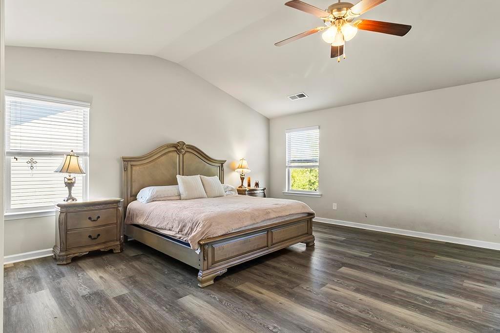 184 Amelia Drive Byron, GA 31008 - Photo 14 of 43 a bedroom with a bed and a window