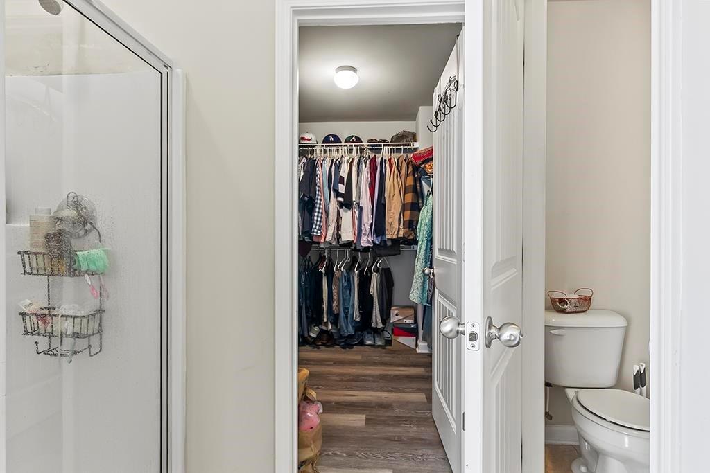 184 Amelia Drive Byron, GA 31008 - Photo 18 of 43 a view of a hallway with wooden floor and entryway