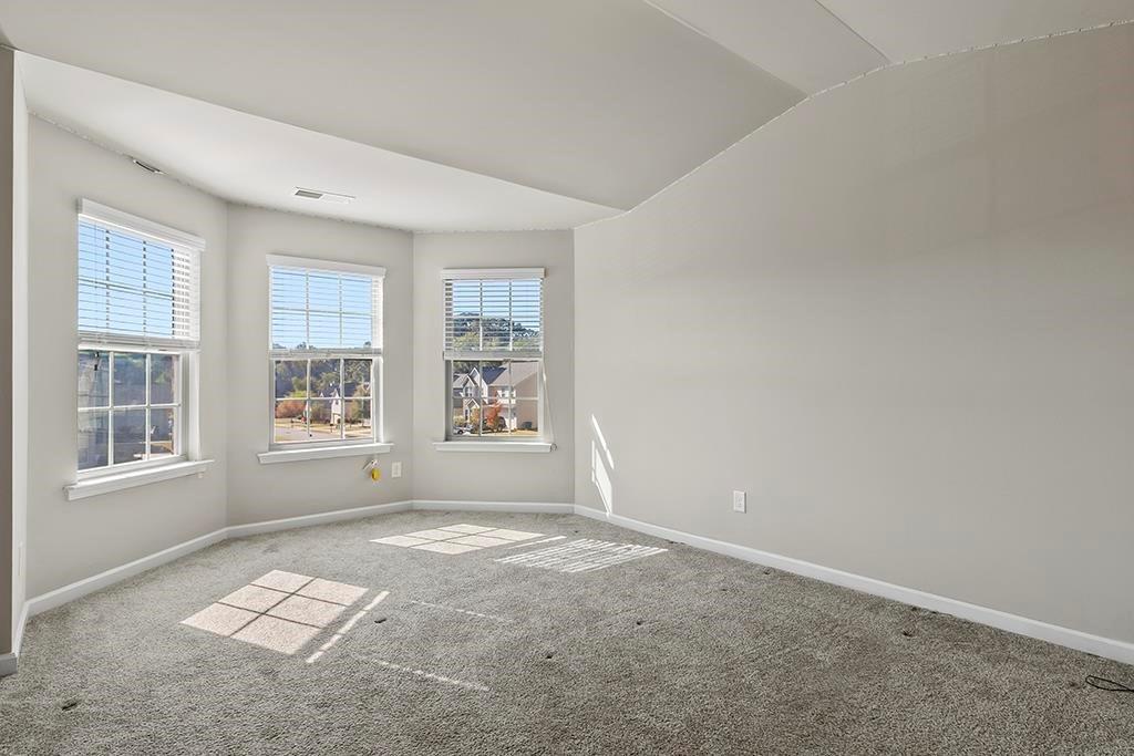 184 Amelia Drive Byron, GA 31008 - Photo 20 of 43 an empty room with windows