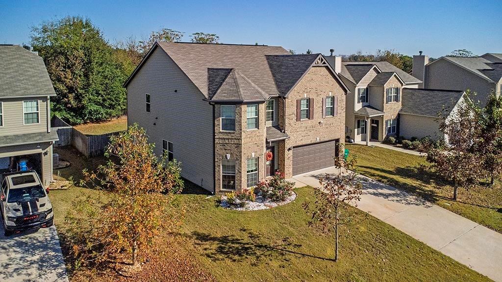 184 Amelia Drive Byron, GA 31008 - Photo 2 of 43 a view of a house with garden
