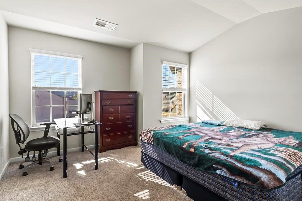 184 Amelia Drive Byron, GA 31008 - Photo 22 of 43 a bedroom with a bed and a window