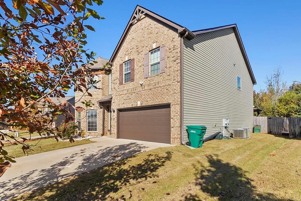 184 Amelia Drive Byron, GA 31008 - Photo 35 of 43 a view of a house with a yard