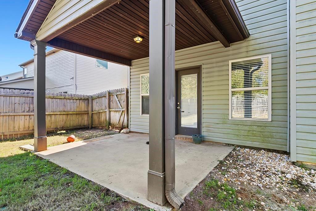 184 Amelia Drive Byron, GA 31008 - Photo 36 of 43 a view of a backyard with seating space