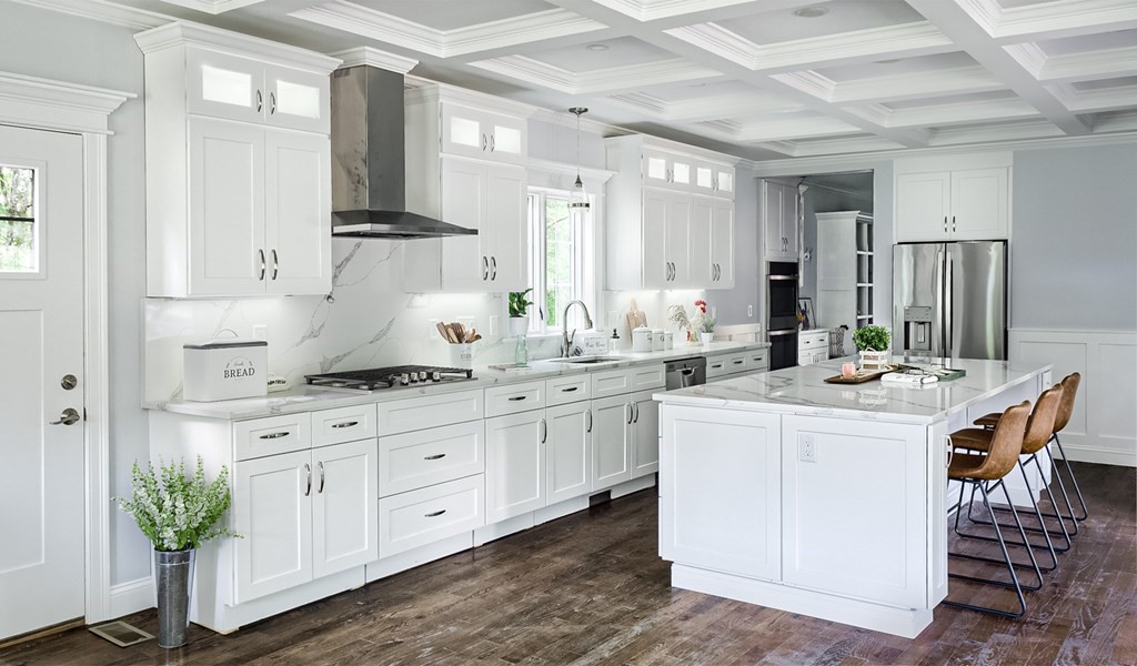 168 River Road East, Unit LOT 2 Hudson, MA 01749 - Photo 1 of 10 a kitchen with kitchen island granite countertop white cabinets and white appliances