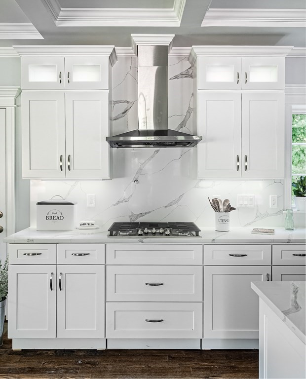 168 River Road East, Unit LOT 2 Hudson, MA 01749 - Photo 3 of 10 a kitchen with white cabinets and white appliances