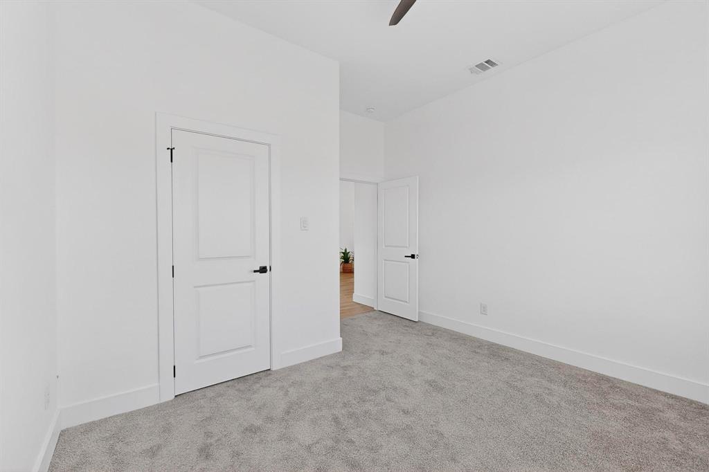 4464 Key Ranch Road Trinidad, TX 75163 - Photo 31 of 40 Unfurnished bedroom featuring carpet and ceiling fan
