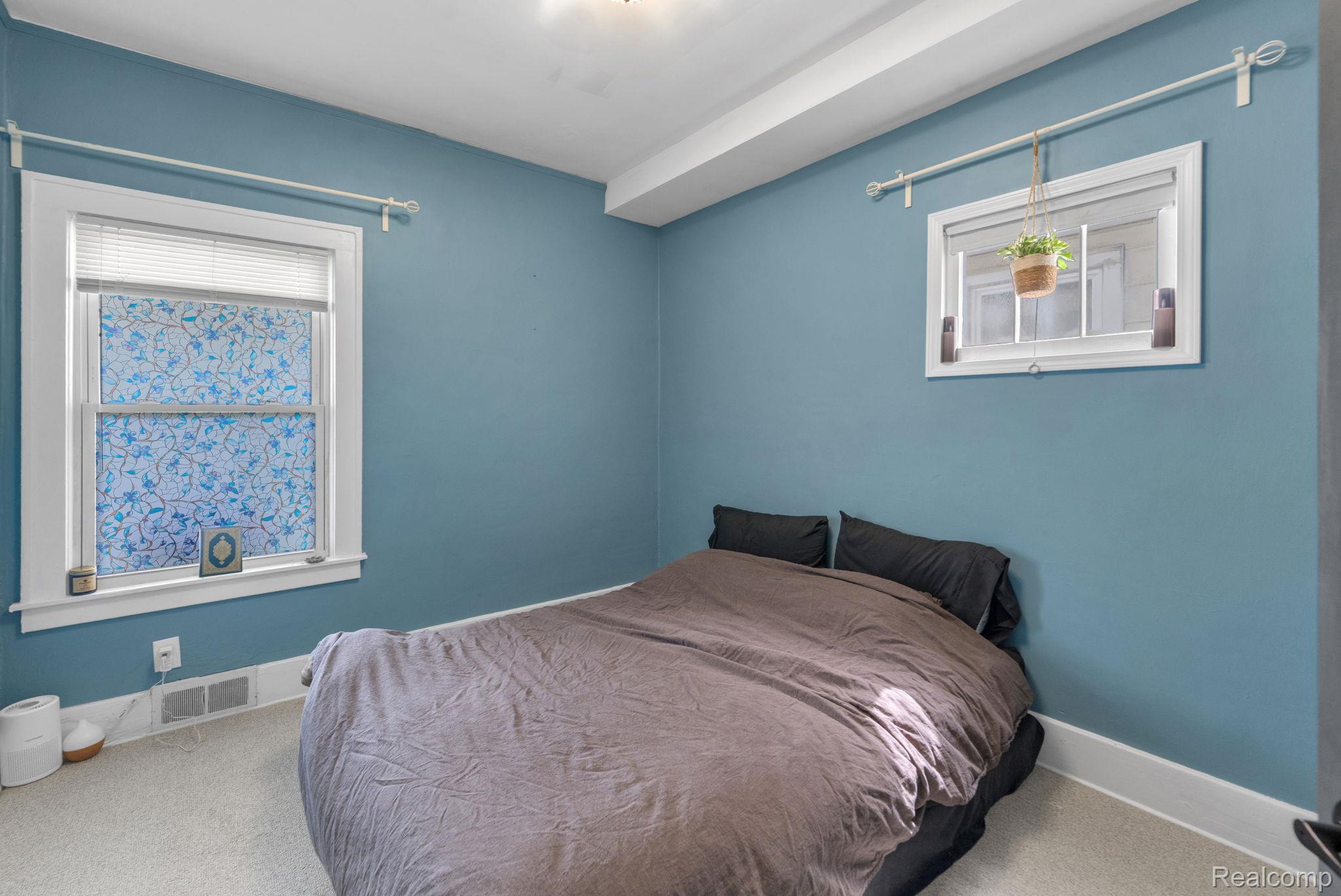 7631 Maple Street Dearborn, MI 48126 - Photo 21 of 48 Wall-to-wall carpeting with painted walls and white trim