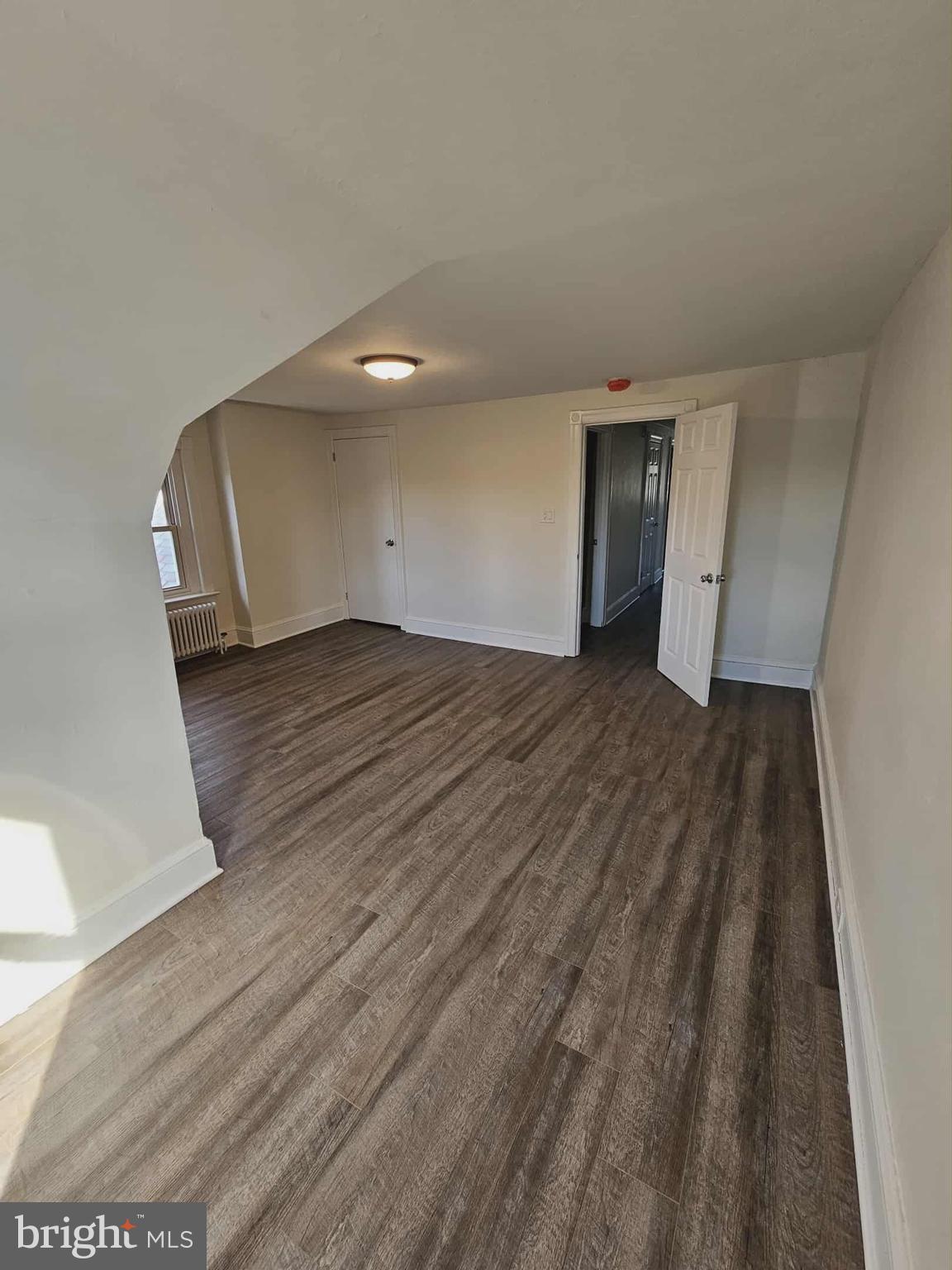 501 West Callowhill Street, Unit 7 Perkasie, PA 18944 - Photo 2 of 8 a view of an empty room and wooden floor