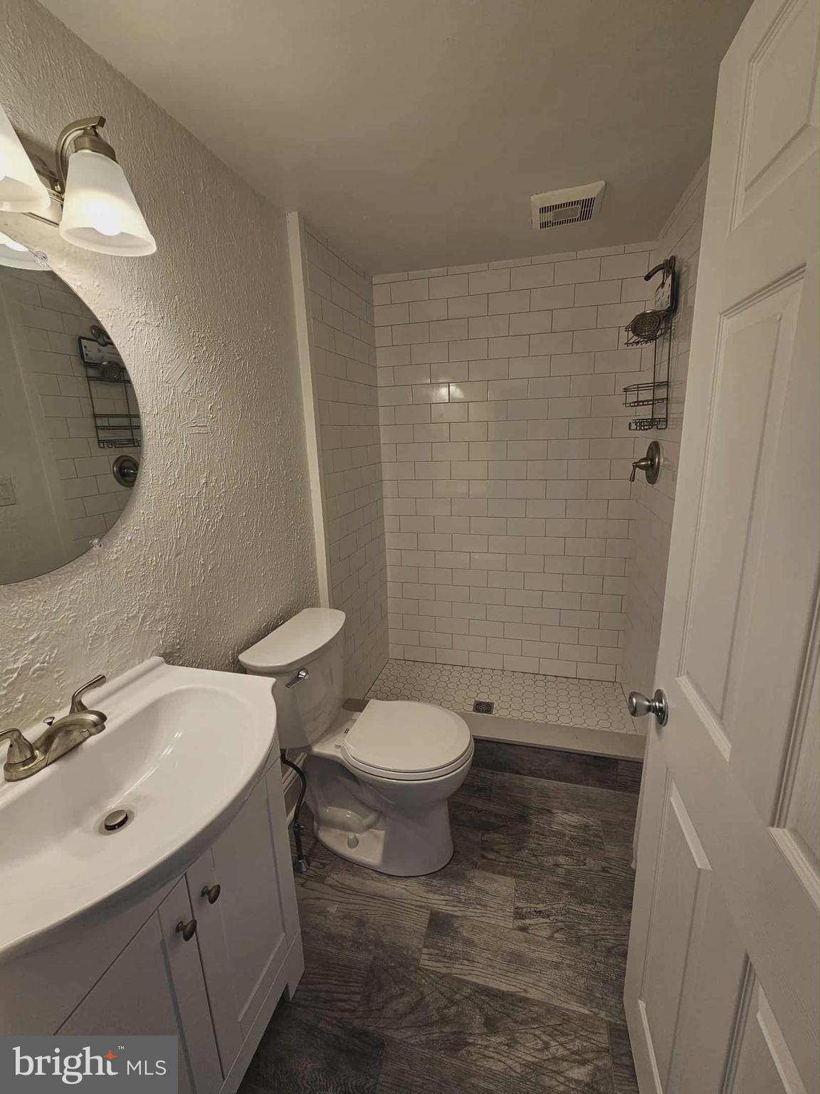 501 West Callowhill Street, Unit 7 Perkasie, PA 18944 - Photo 7 of 8 a bathroom with a sink toilet and shower
